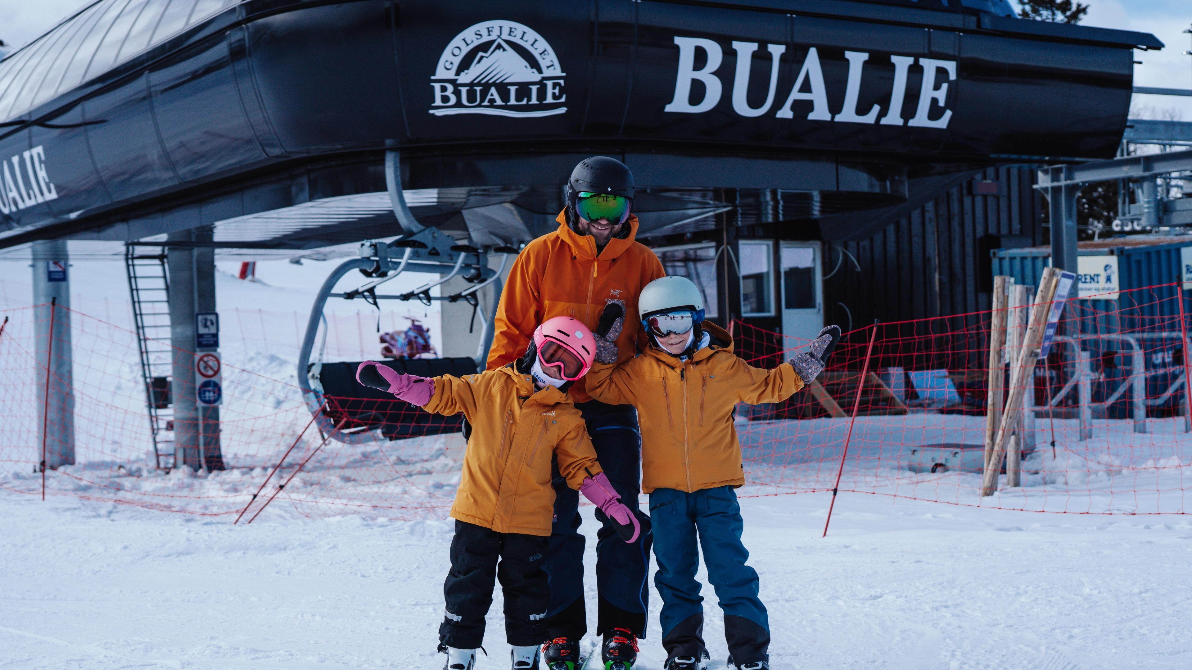 A family in front of Bualie in Gol, Eastern Norway.