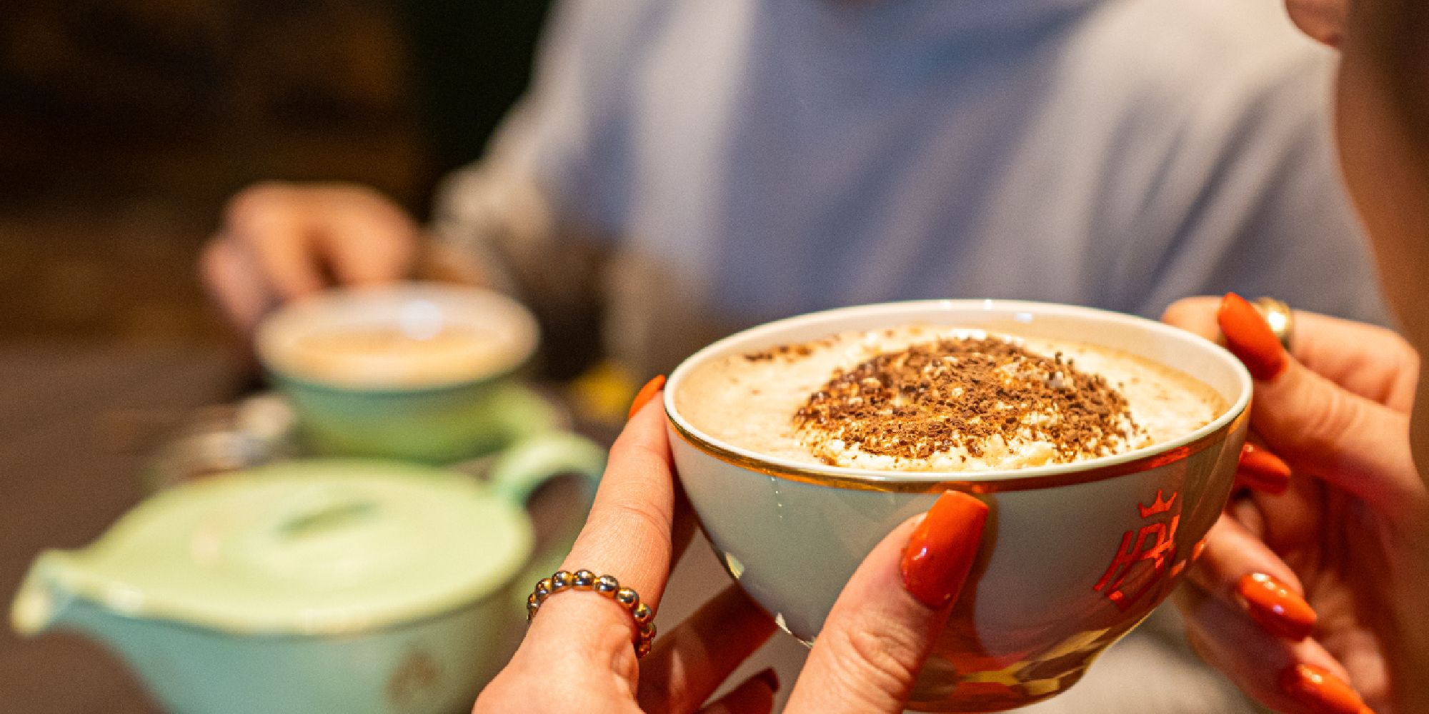 People drinking hot chocolate.