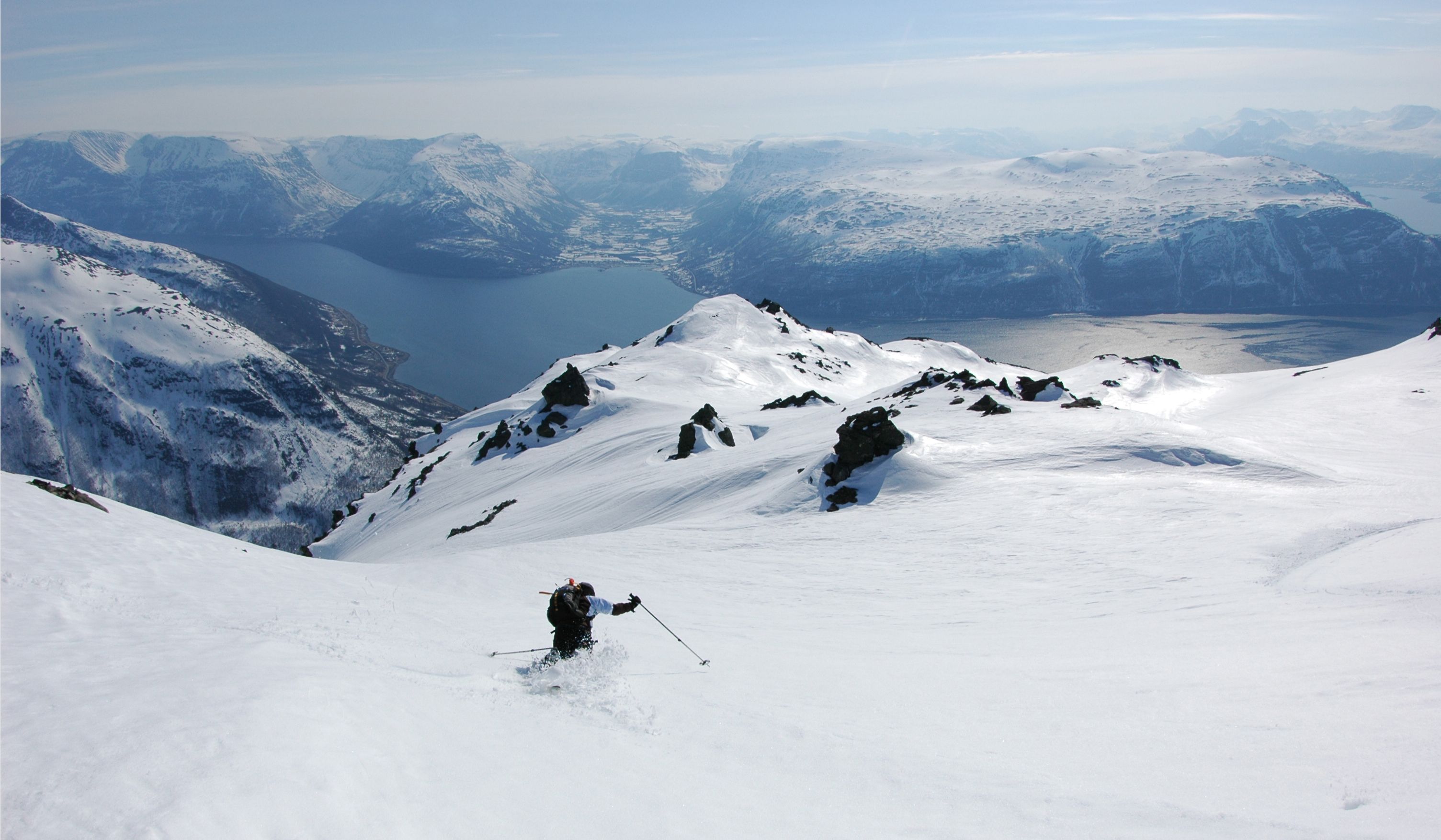 A person freeriding in the Lyngen alps