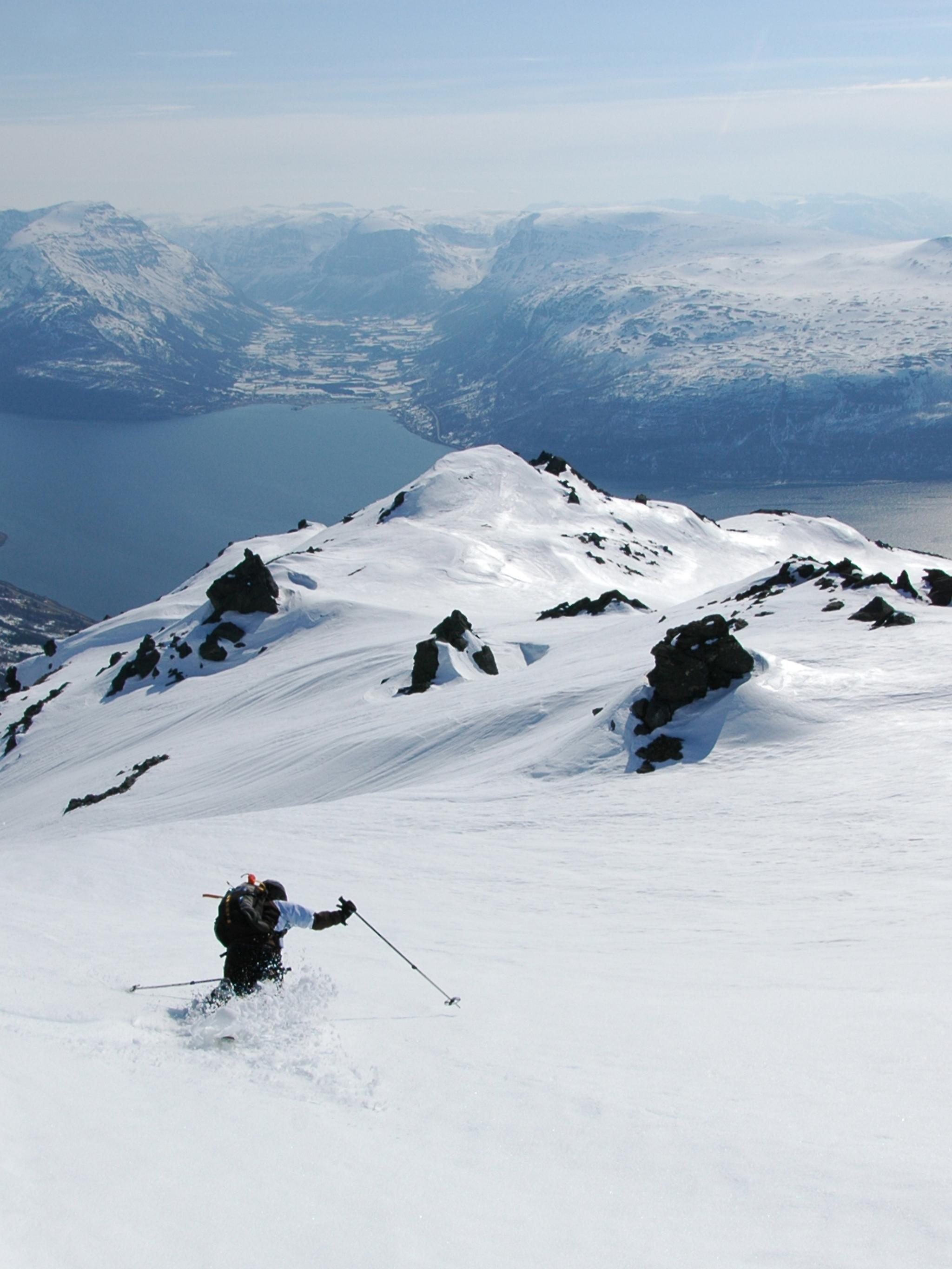 A person freeriding in the Lyngen alps