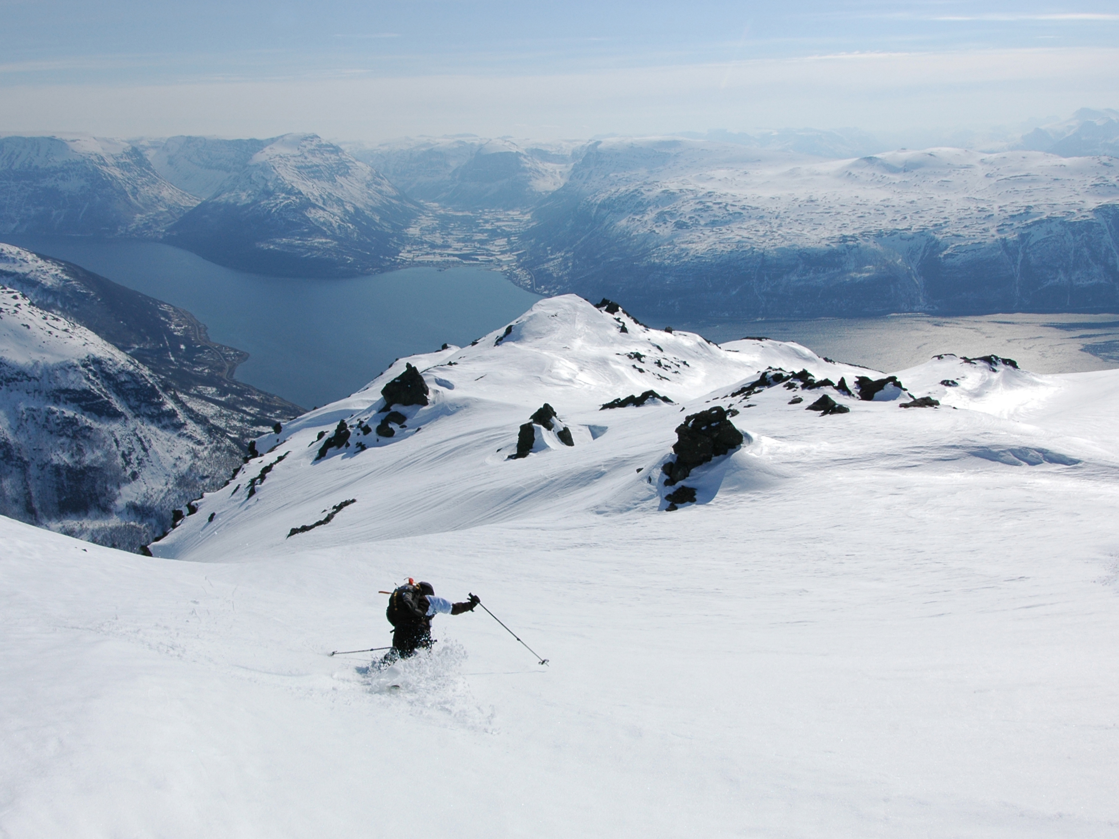 A person freeriding in the Lyngen alps