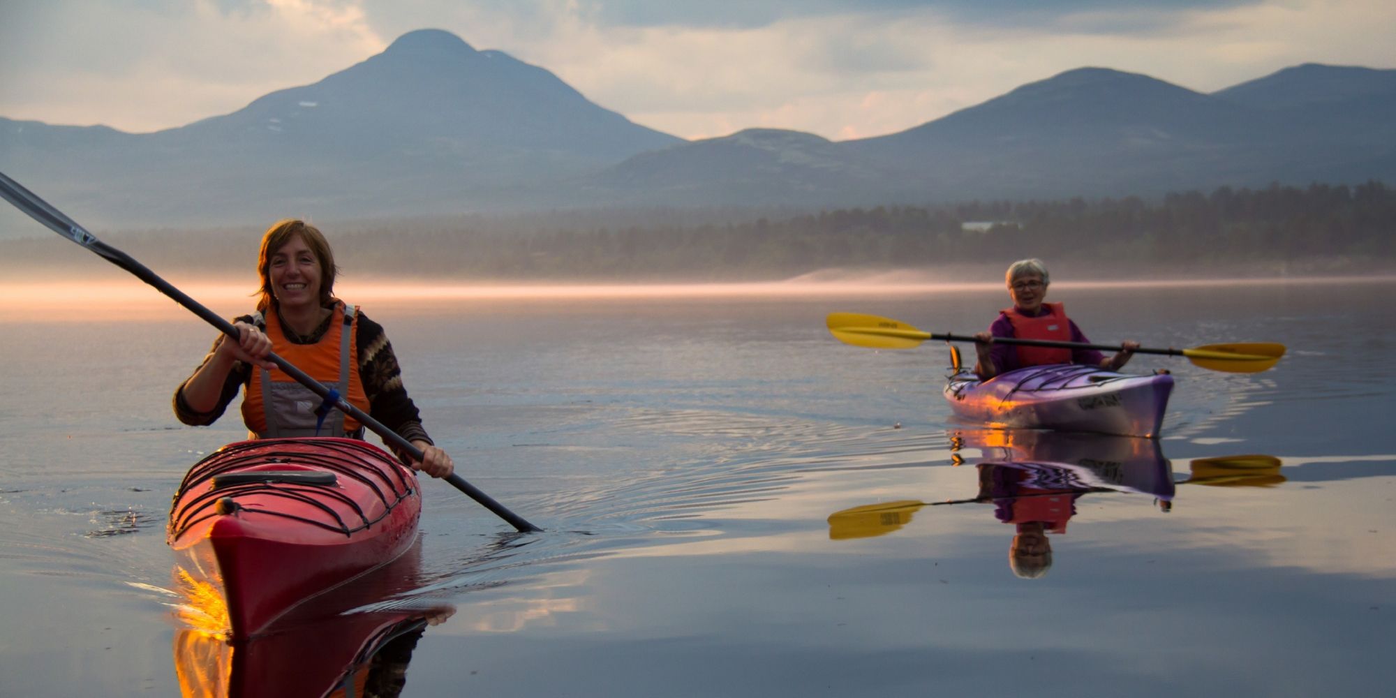 Two people paddling on Lake Femunden in Eastern Norway