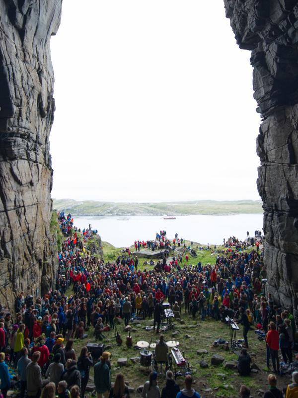 A view at the Træna festival in Helgeland seen through the mountain Kirkhellern