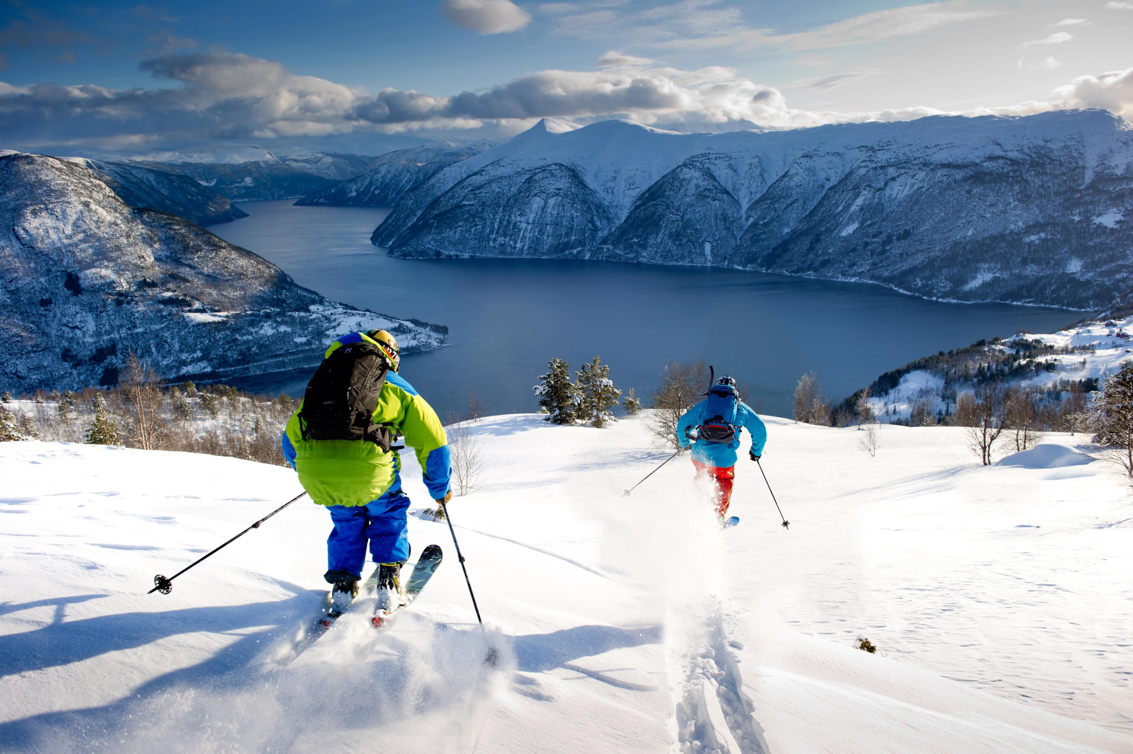Two people are downhill skiing in Luster in the Sognefjord area of Fjord Norway