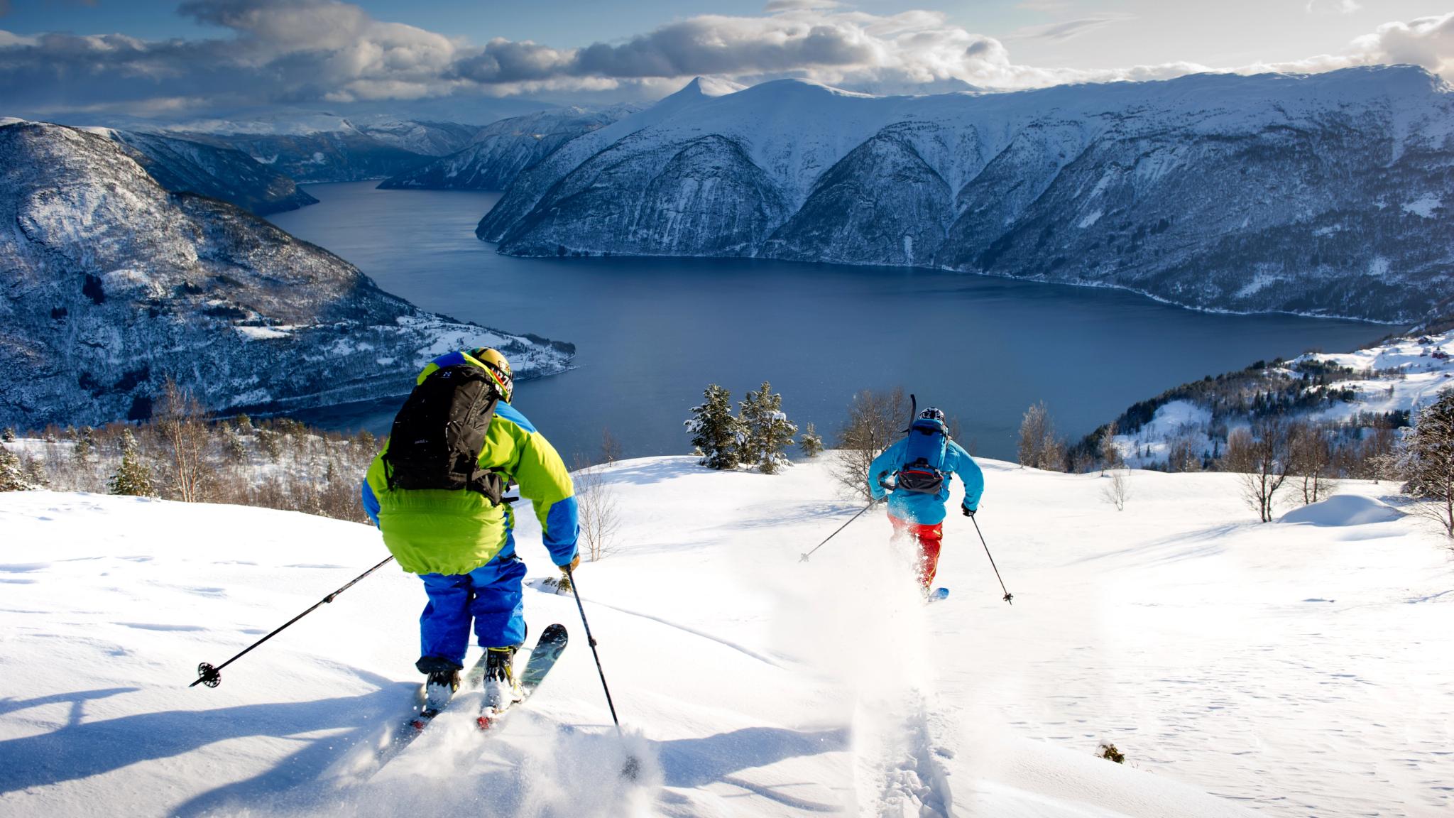 Two people are downhill skiing in Luster in the Sognefjord area of Fjord Norway