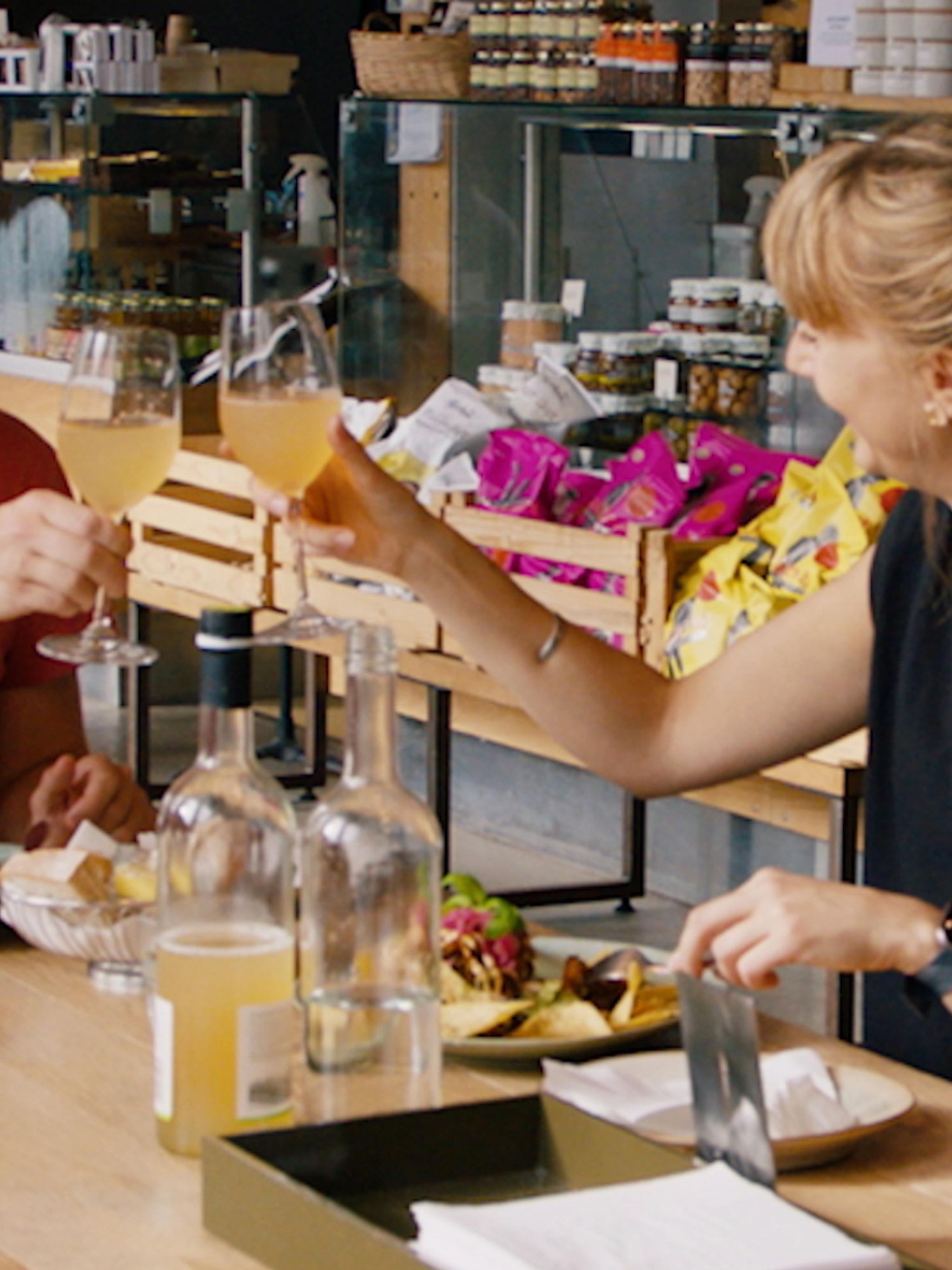 A couple toasting at restaurant in Stavanger