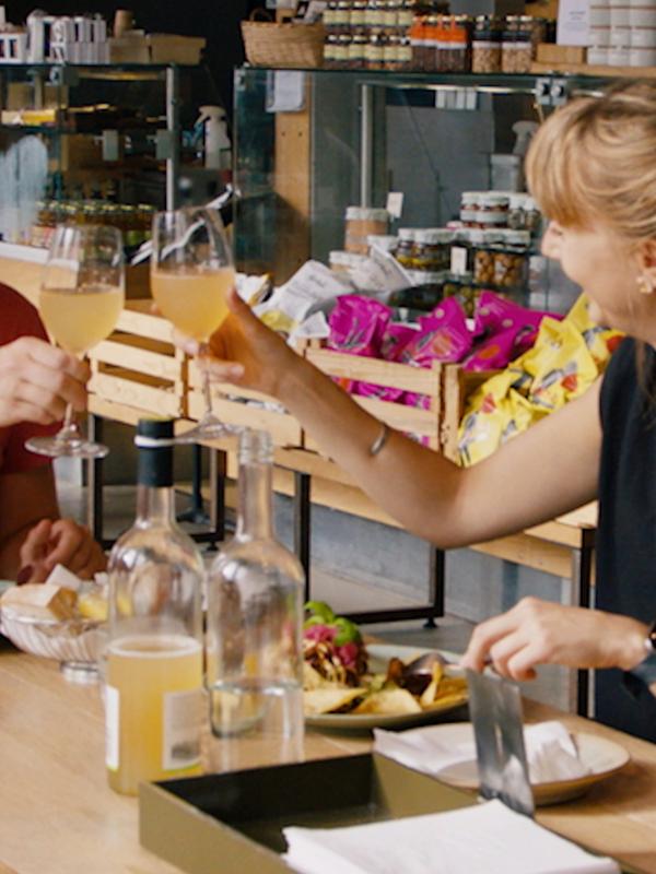 A couple toasting at restaurant in Stavanger