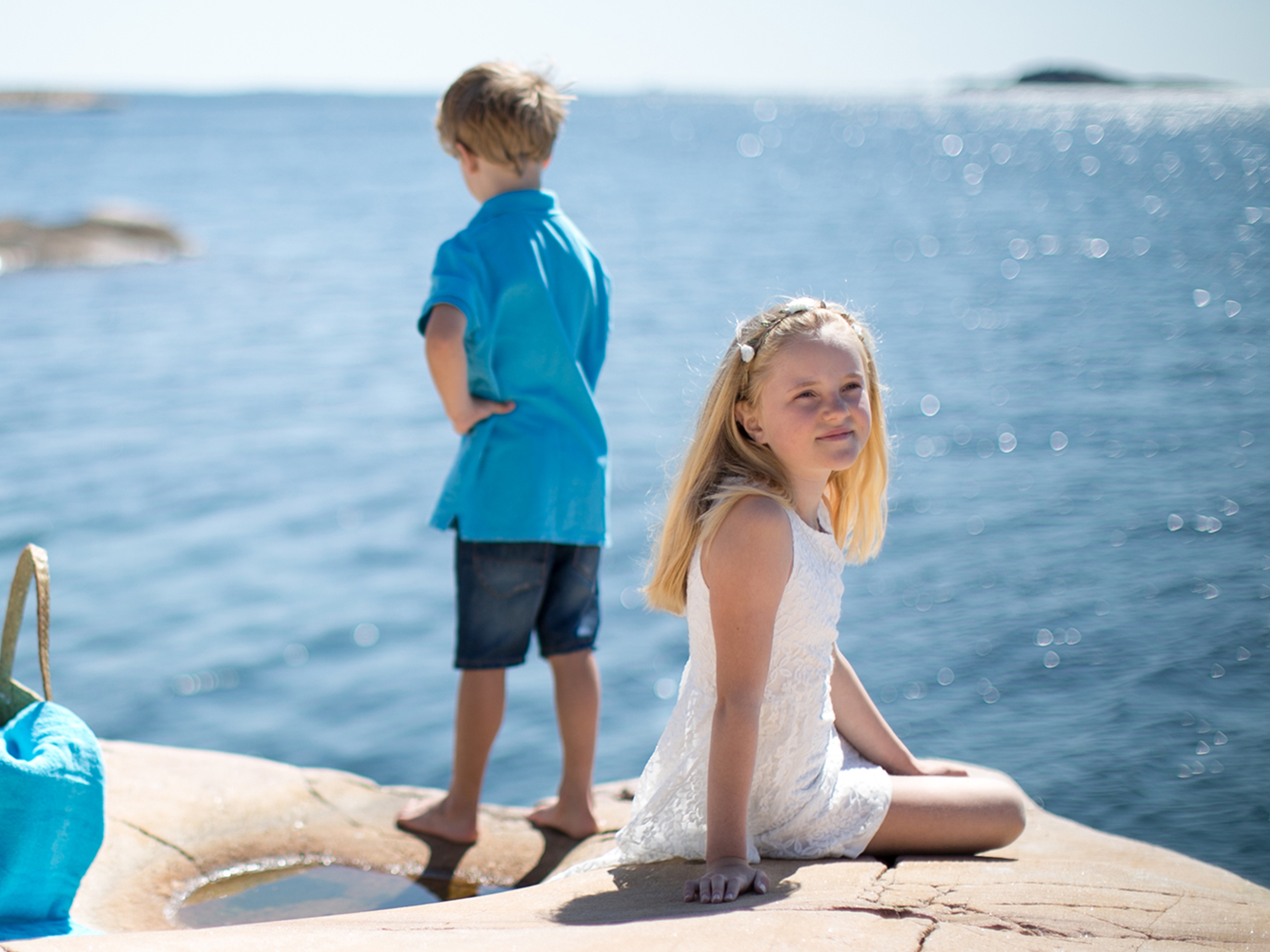 Two children by the sea at Bragdøya in Kristiansand