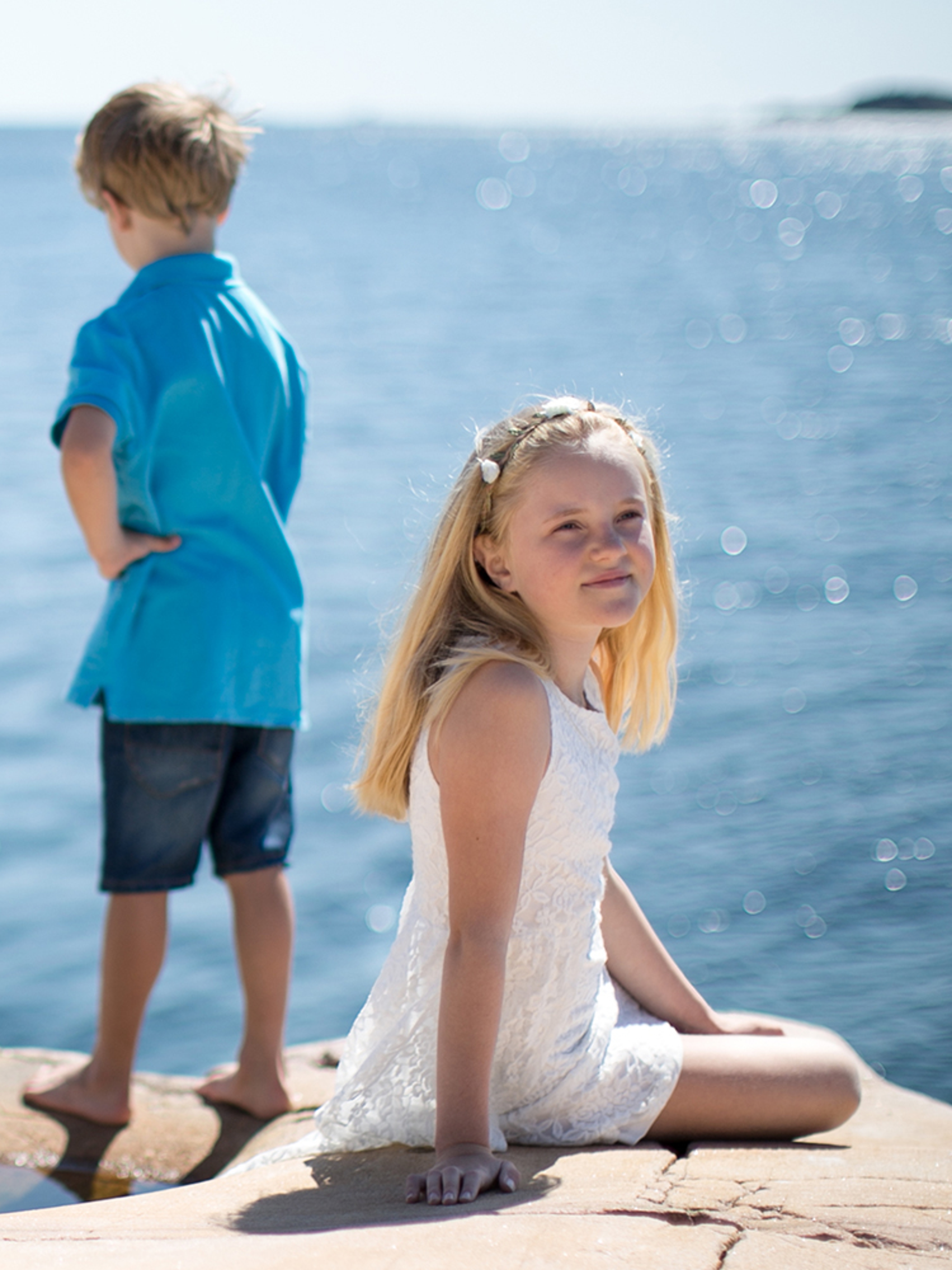 Two children by the sea at Bragdøya in Kristiansand