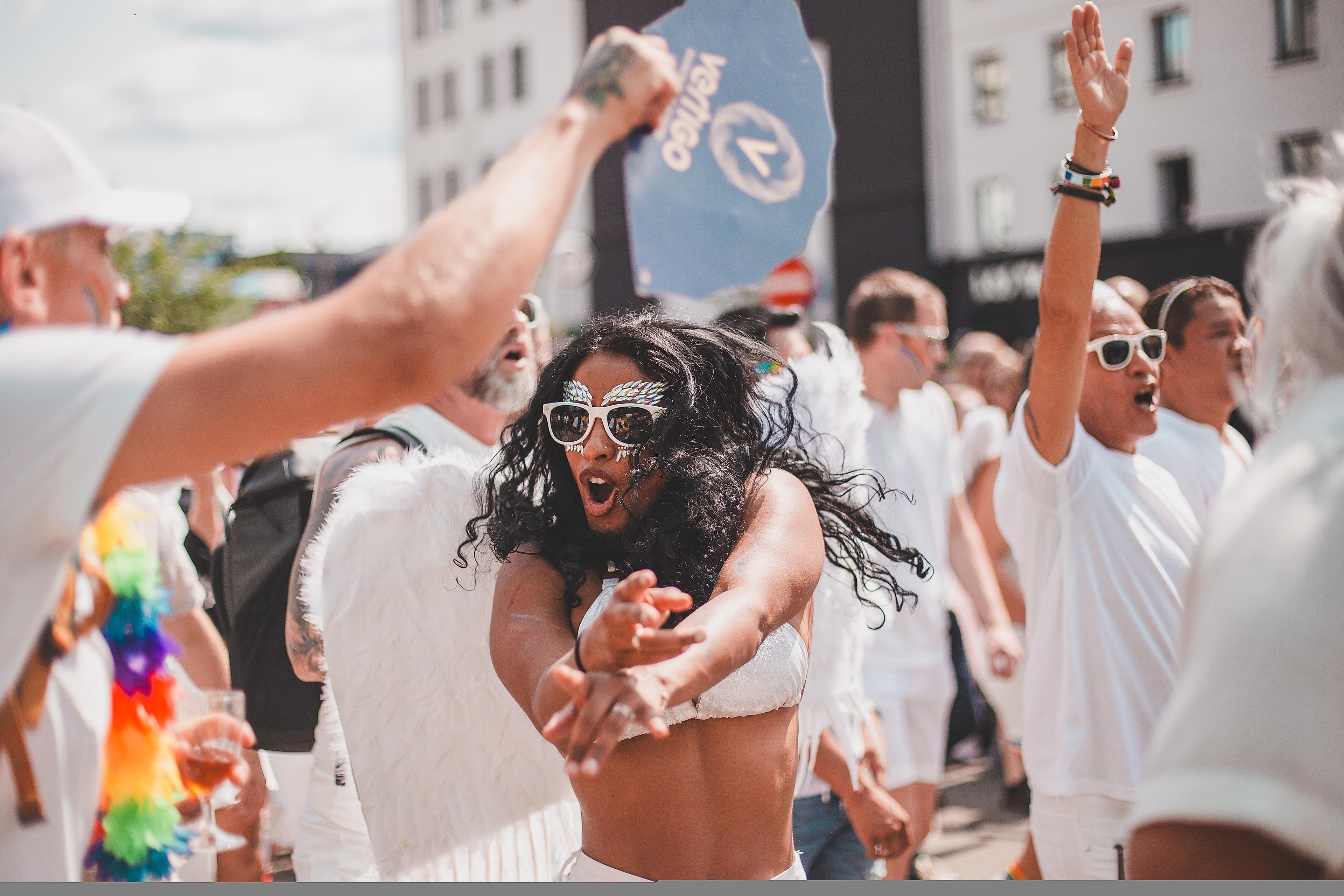 Woman dancing in the Oslo Pride parade, in 2023