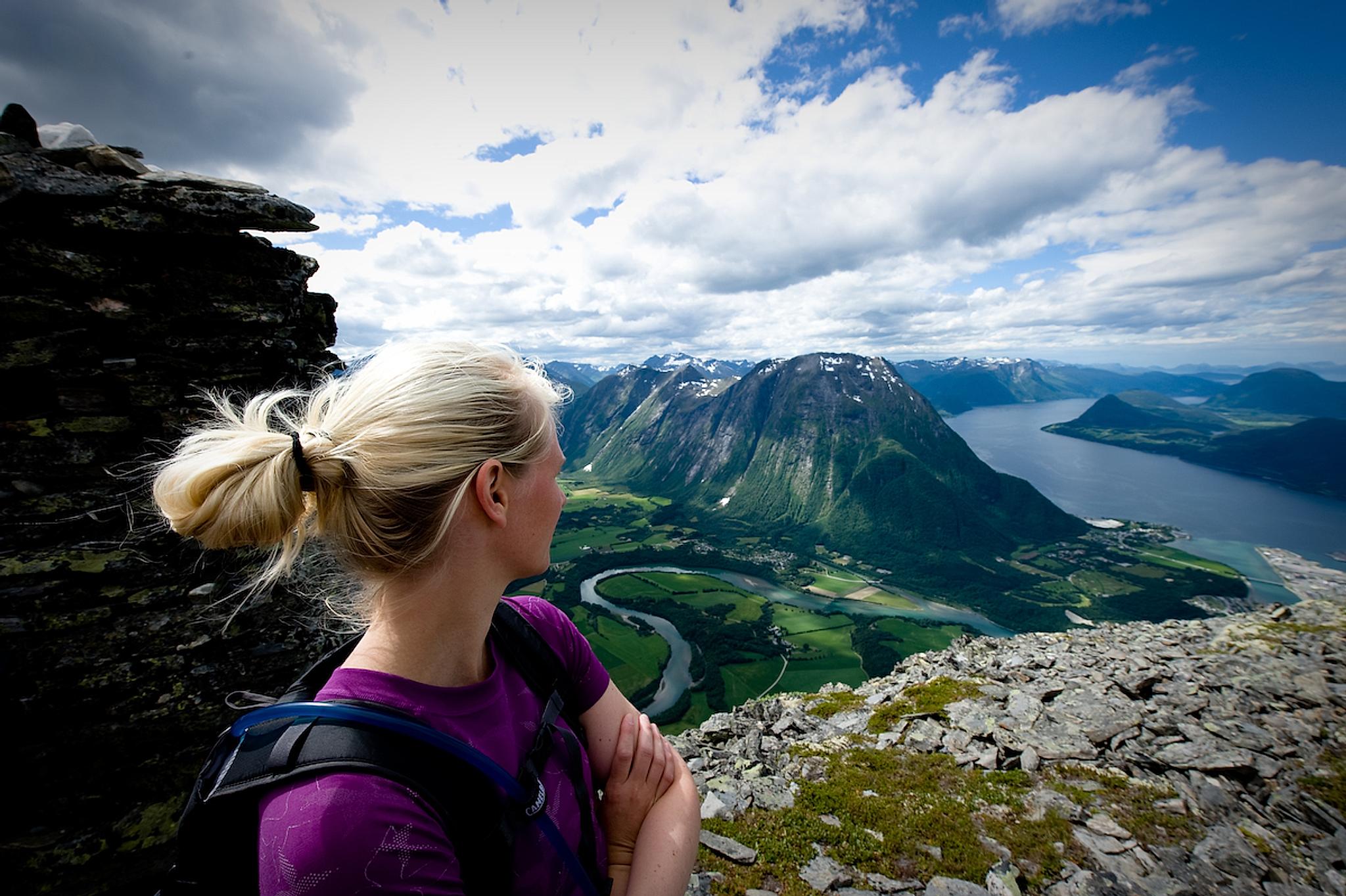 Hiking the Romsdalseggen ridge in Åndalsnes, Fjord Norway