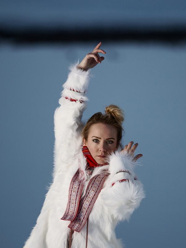 The rebirth of the joik: portrait photo of the Sami artist Elle Márjá Eira outside during winter in Northern Norway.