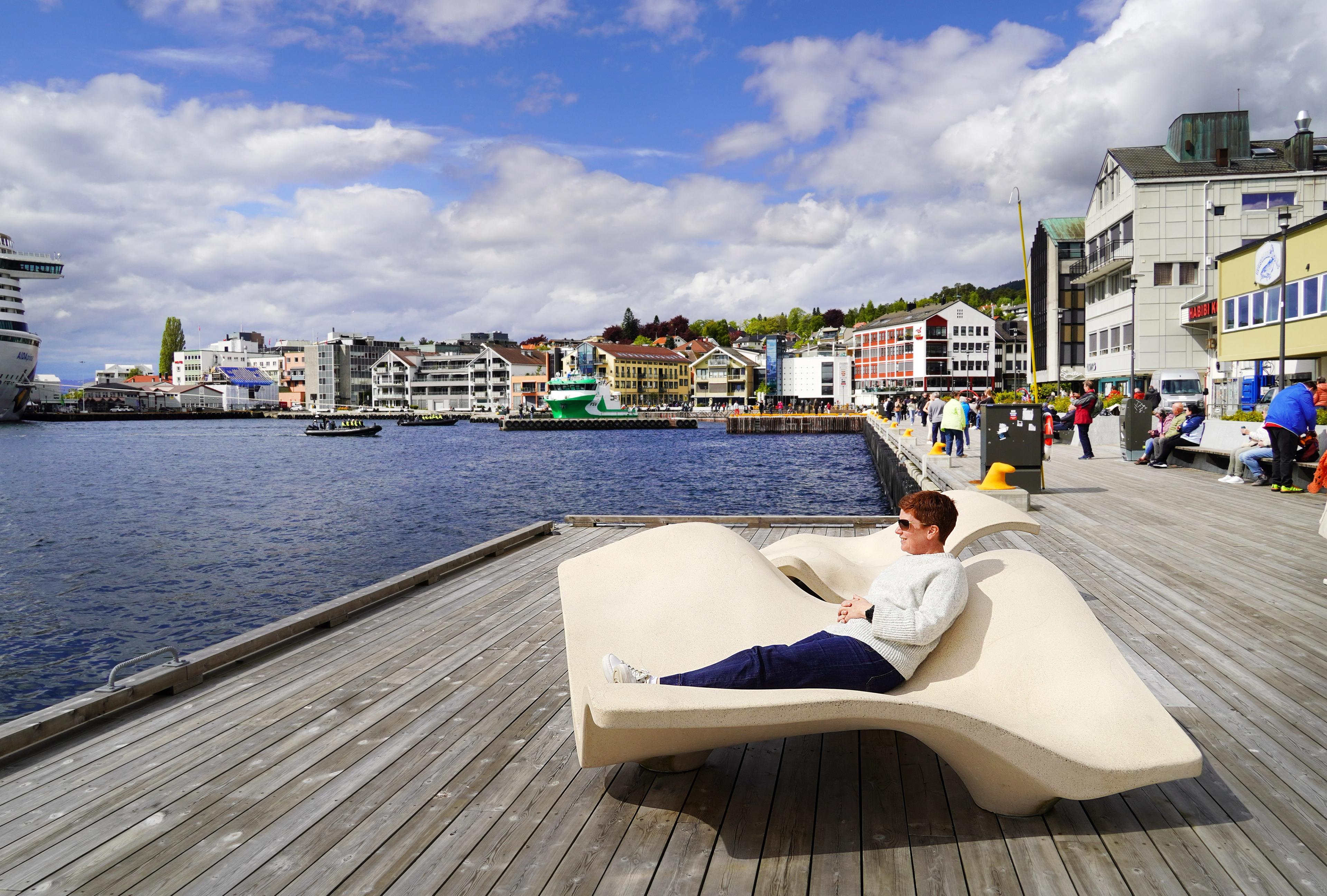 A woman sitting in a sun shair in Molde in the Northwest.