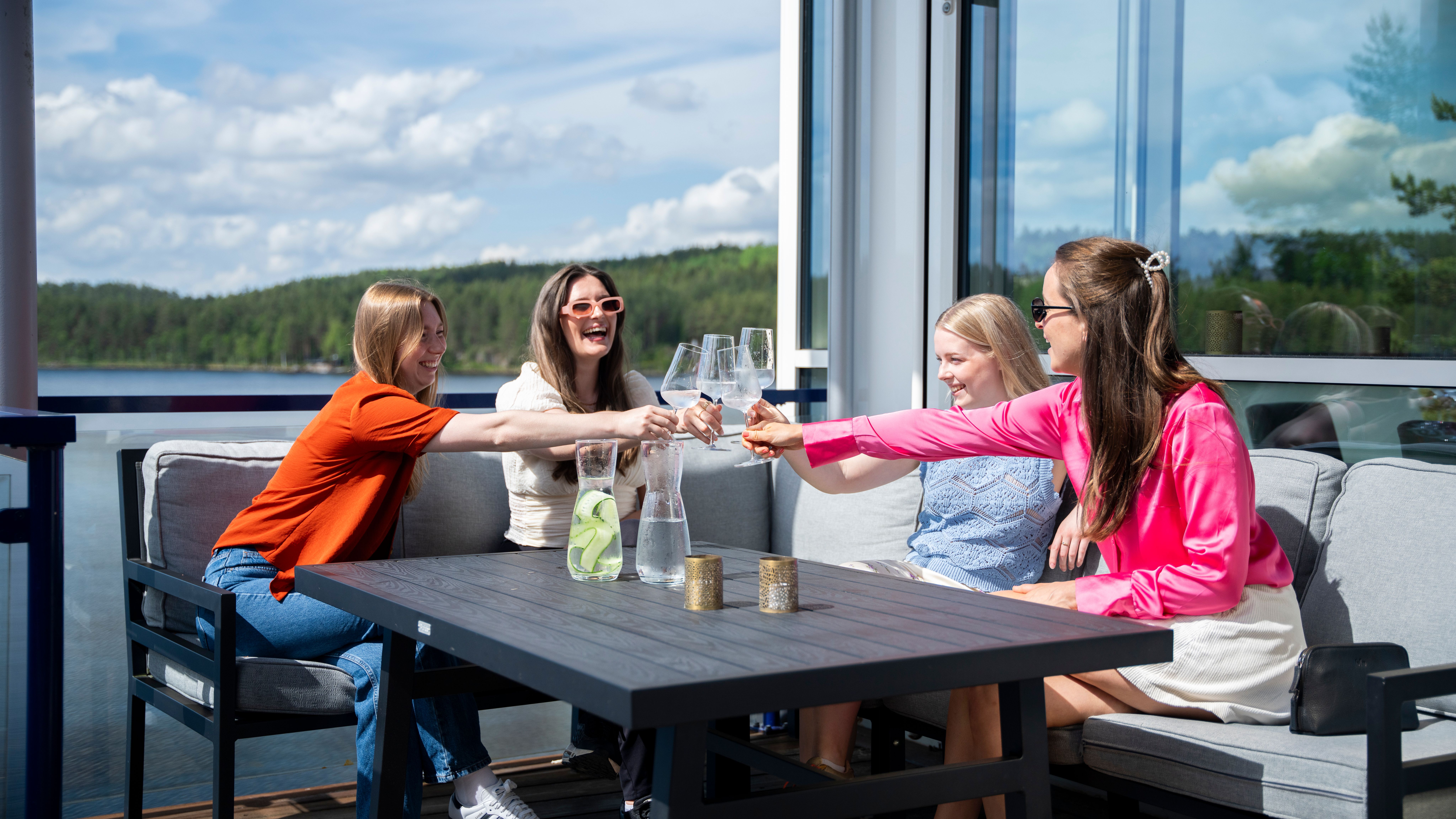 Women enjoying the outdoor terrace at Rømskog Spa & Resort