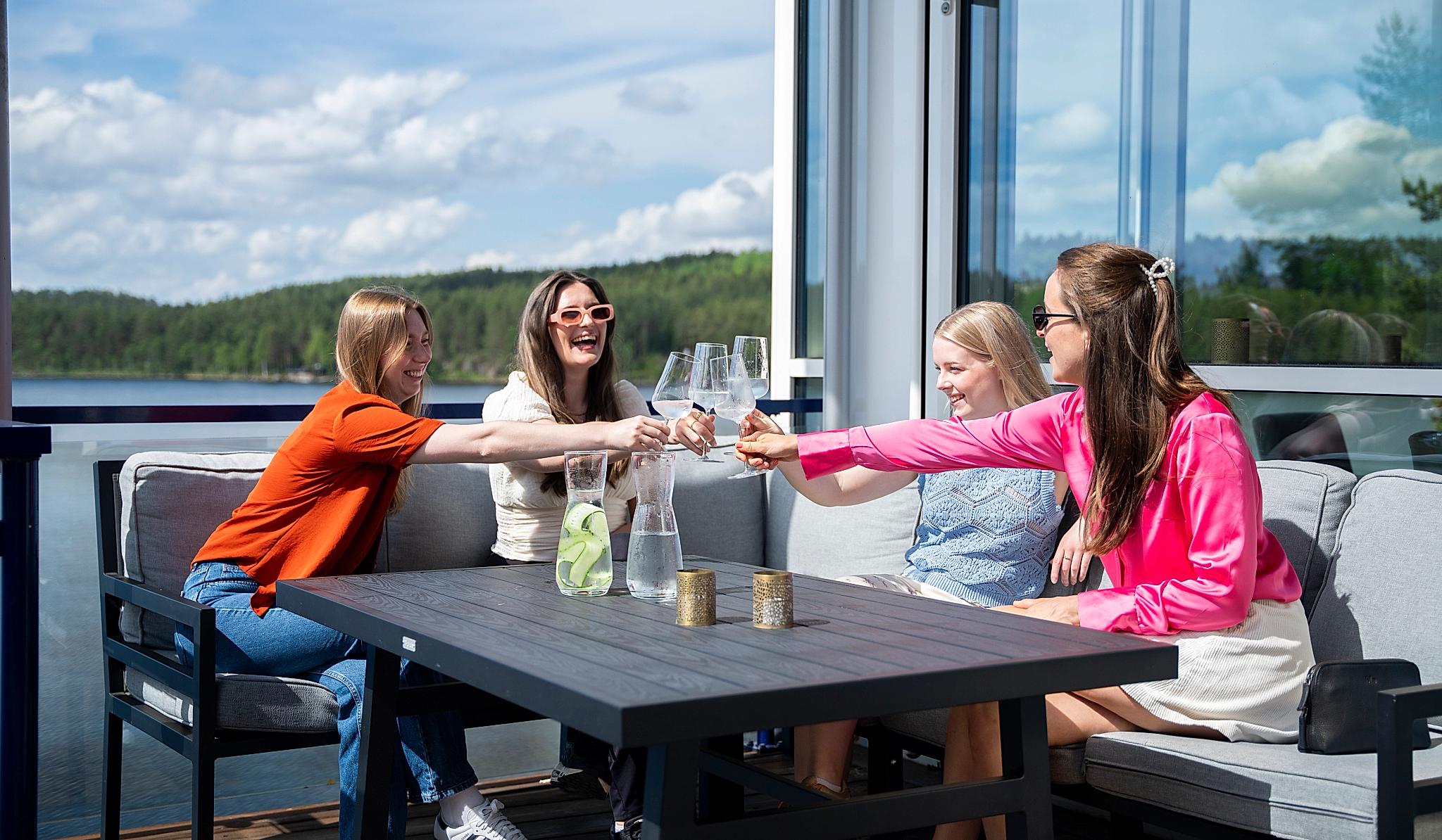 Women enjoying the outdoor terrace at Rømskog Spa & Resort