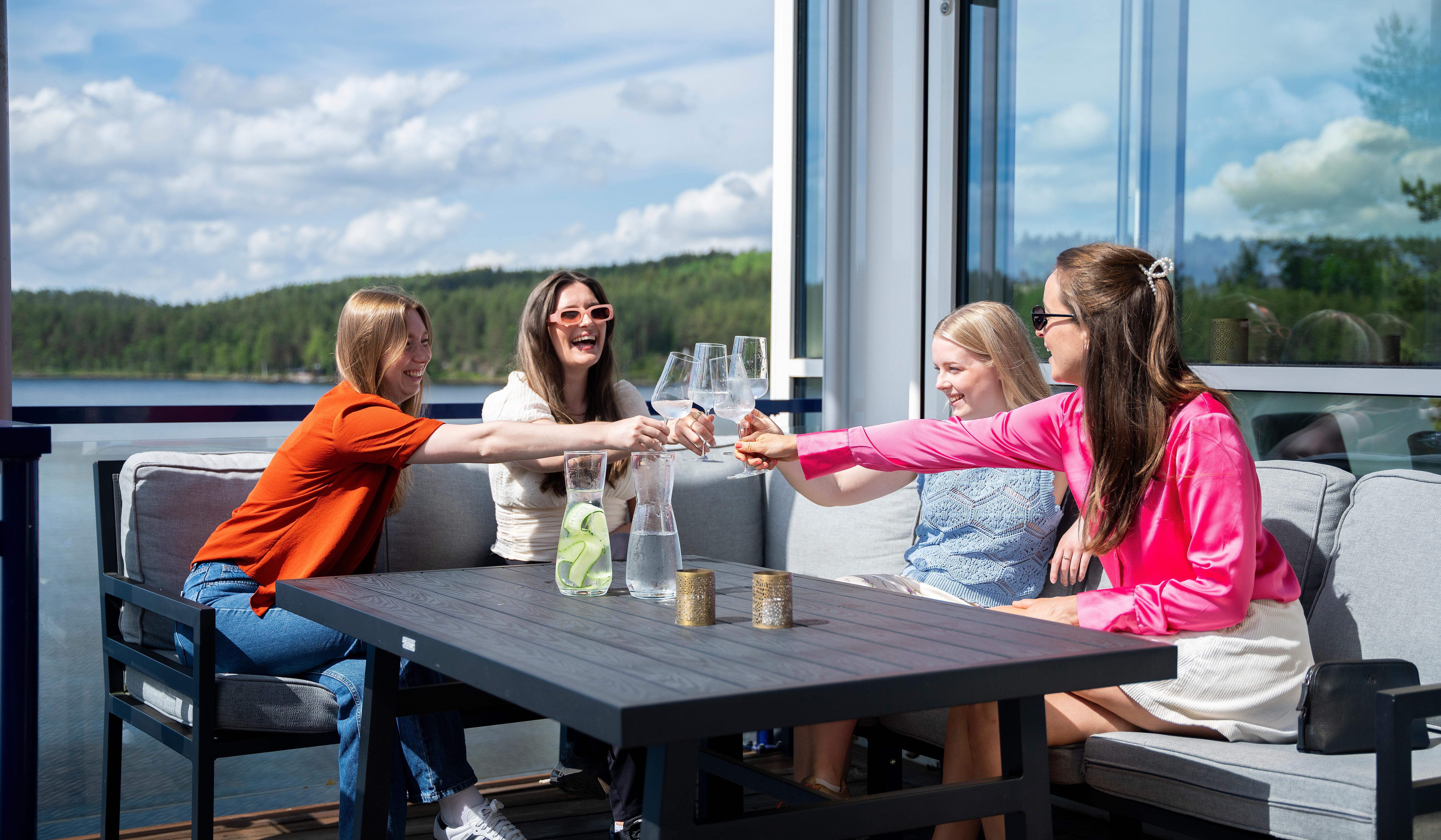 Women enjoying the outdoor terrace at Rømskog Spa & Resort