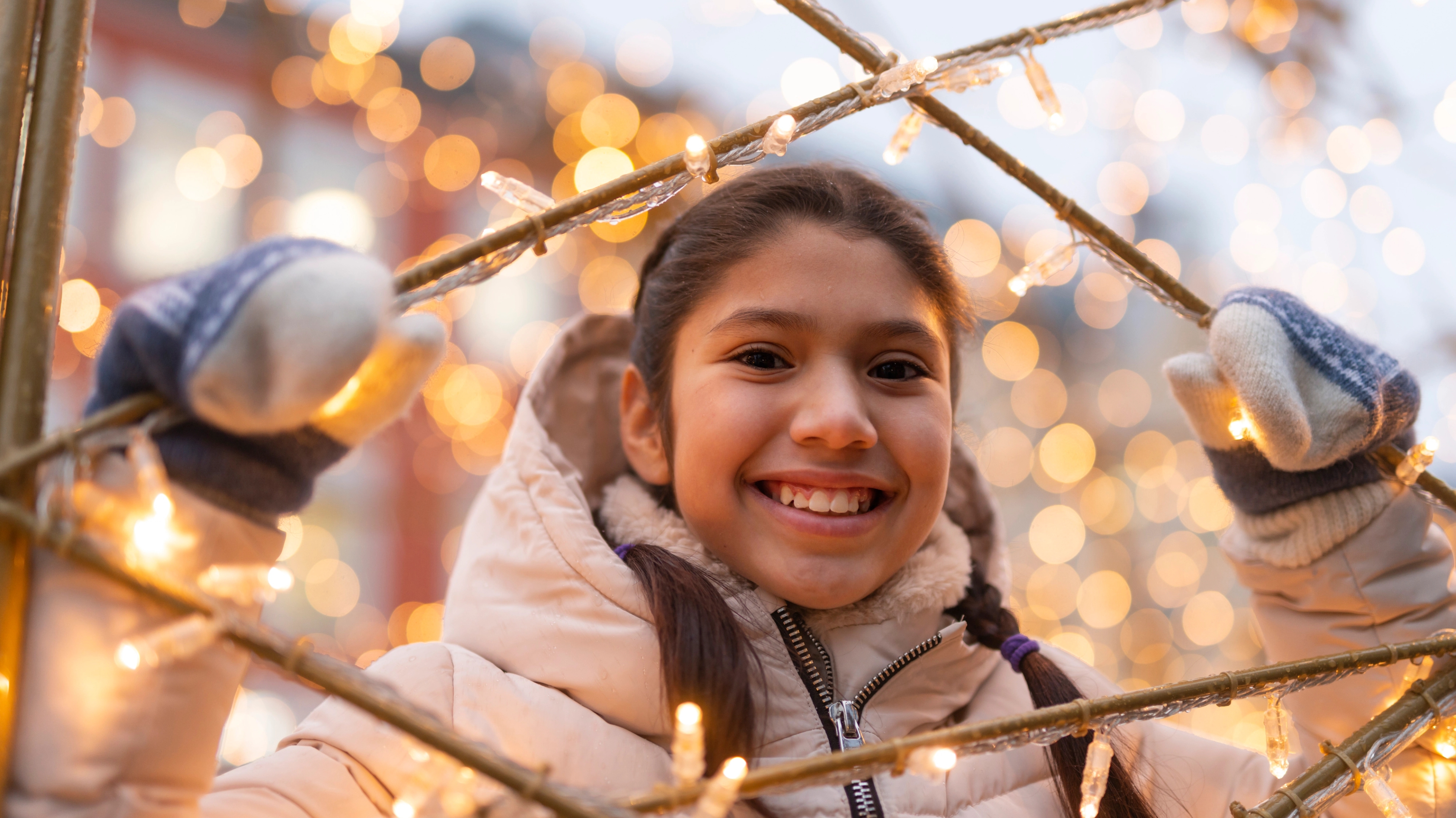 A girl smiling in Kristiansand Christmas town
