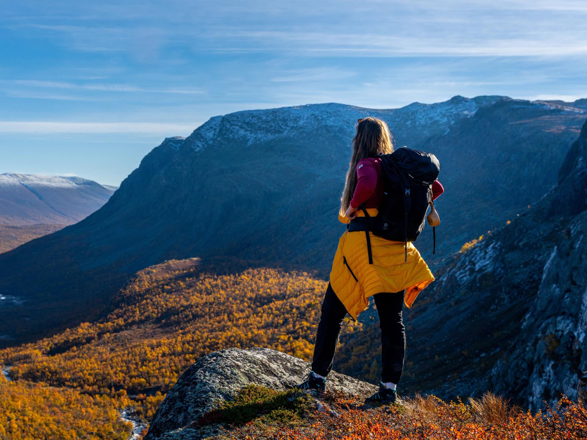 Woman enjoying the autumn view of Hydalen in Hemsedal