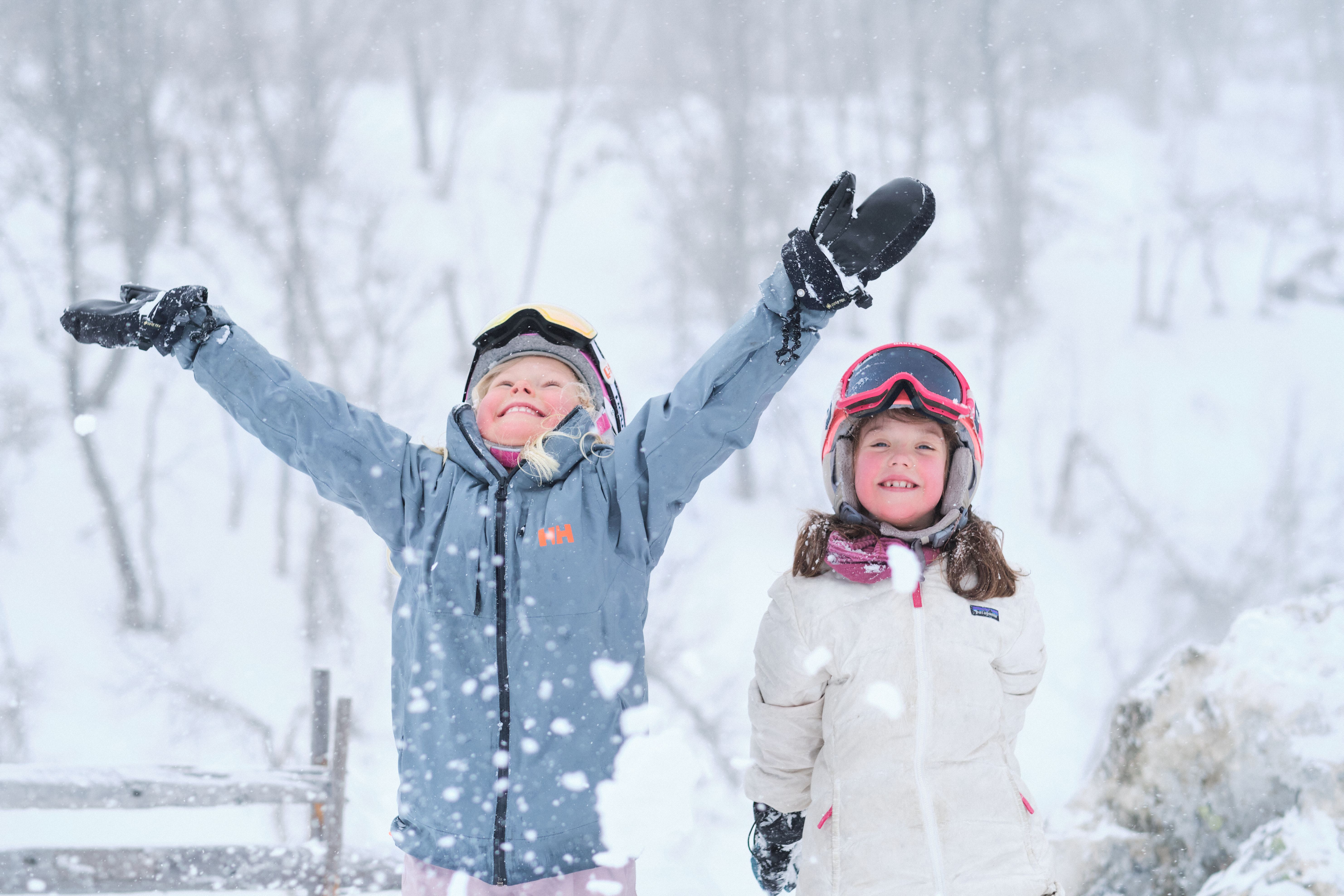 Children playing with the snow in Hemsedal, Norway.