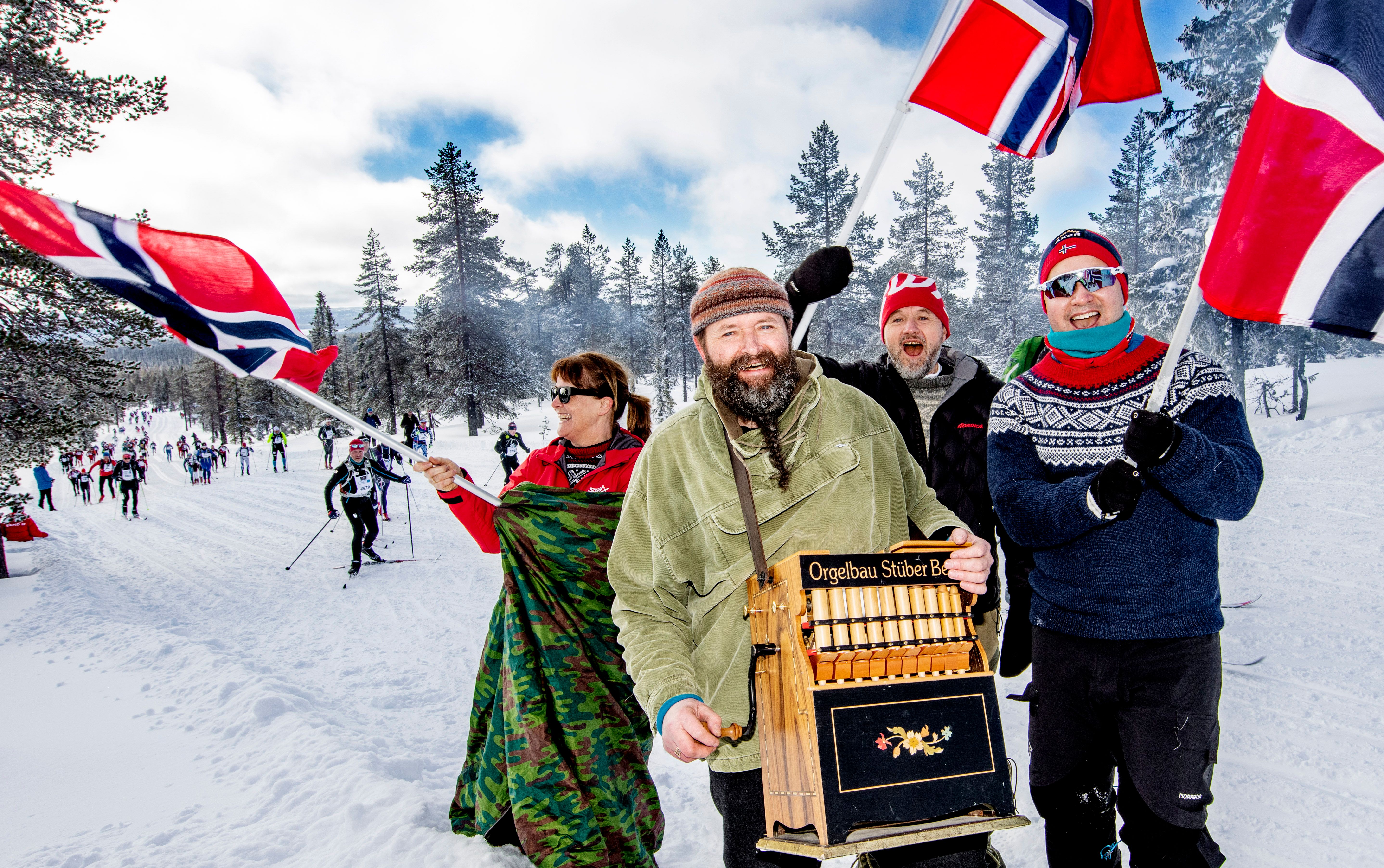 People cheering for skiers during the Birkebeiner ski race, Eastern Norway
