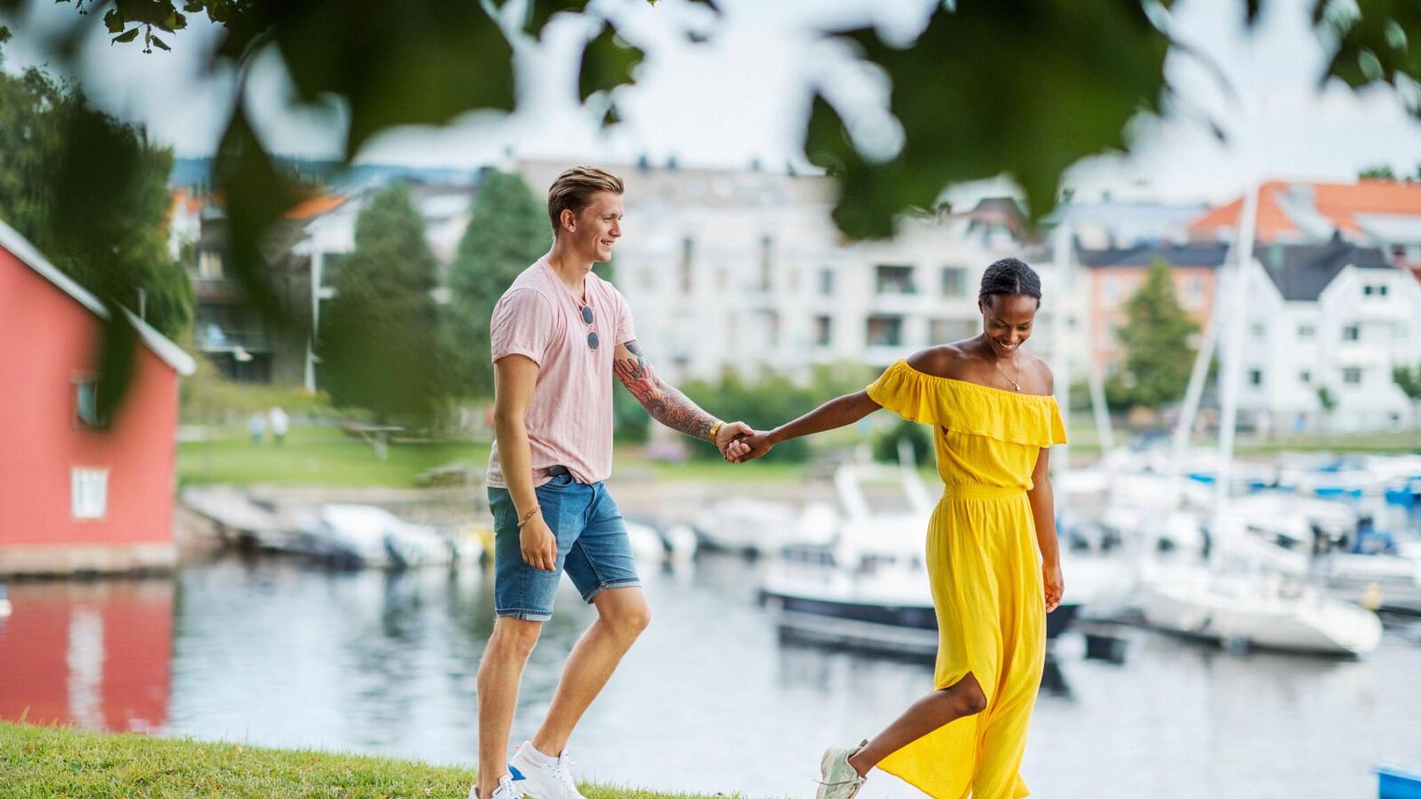 A couple having a romantic walk in Kristiansand, Norway