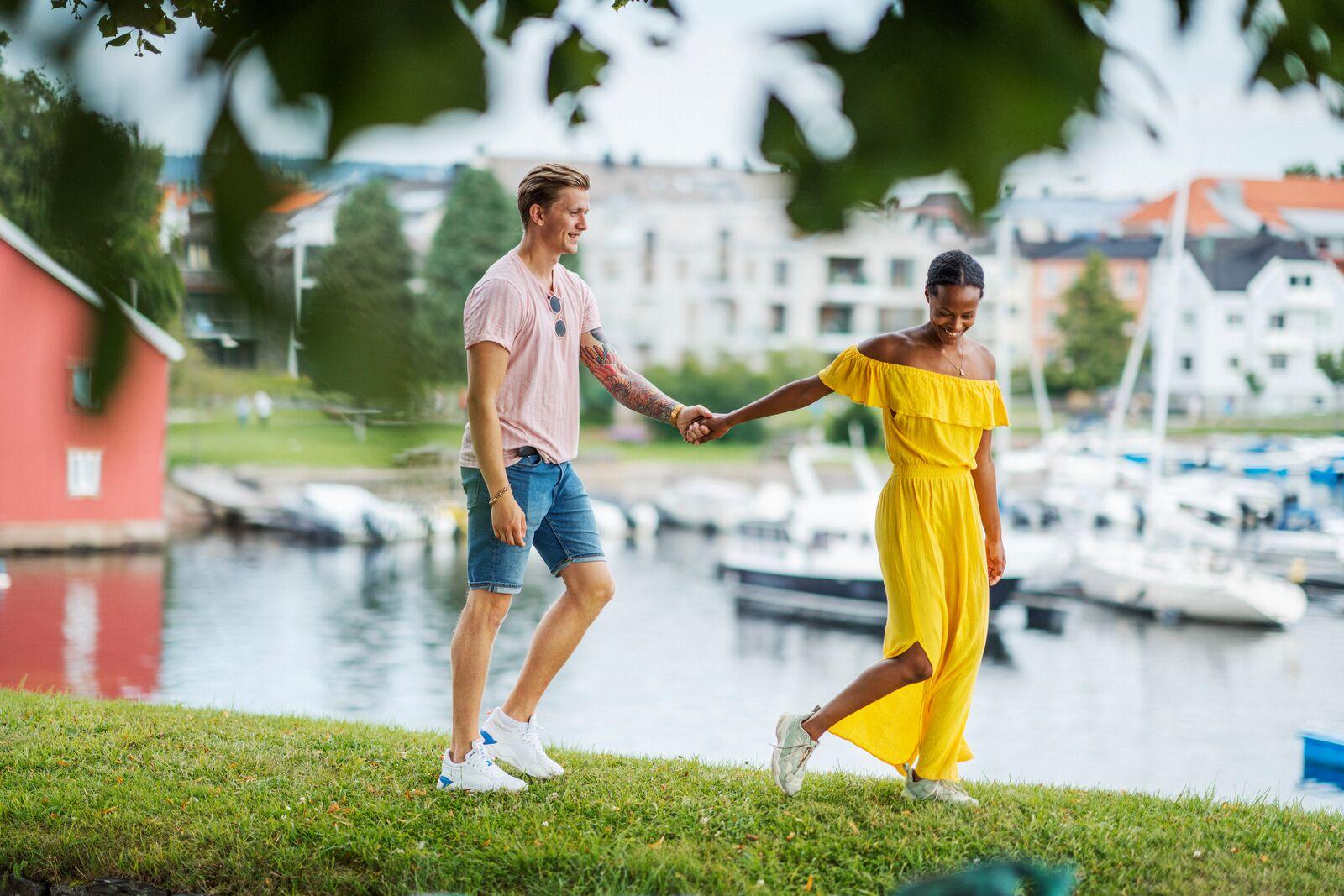 A couple having a romantic walk in Kristiansand, Norway
