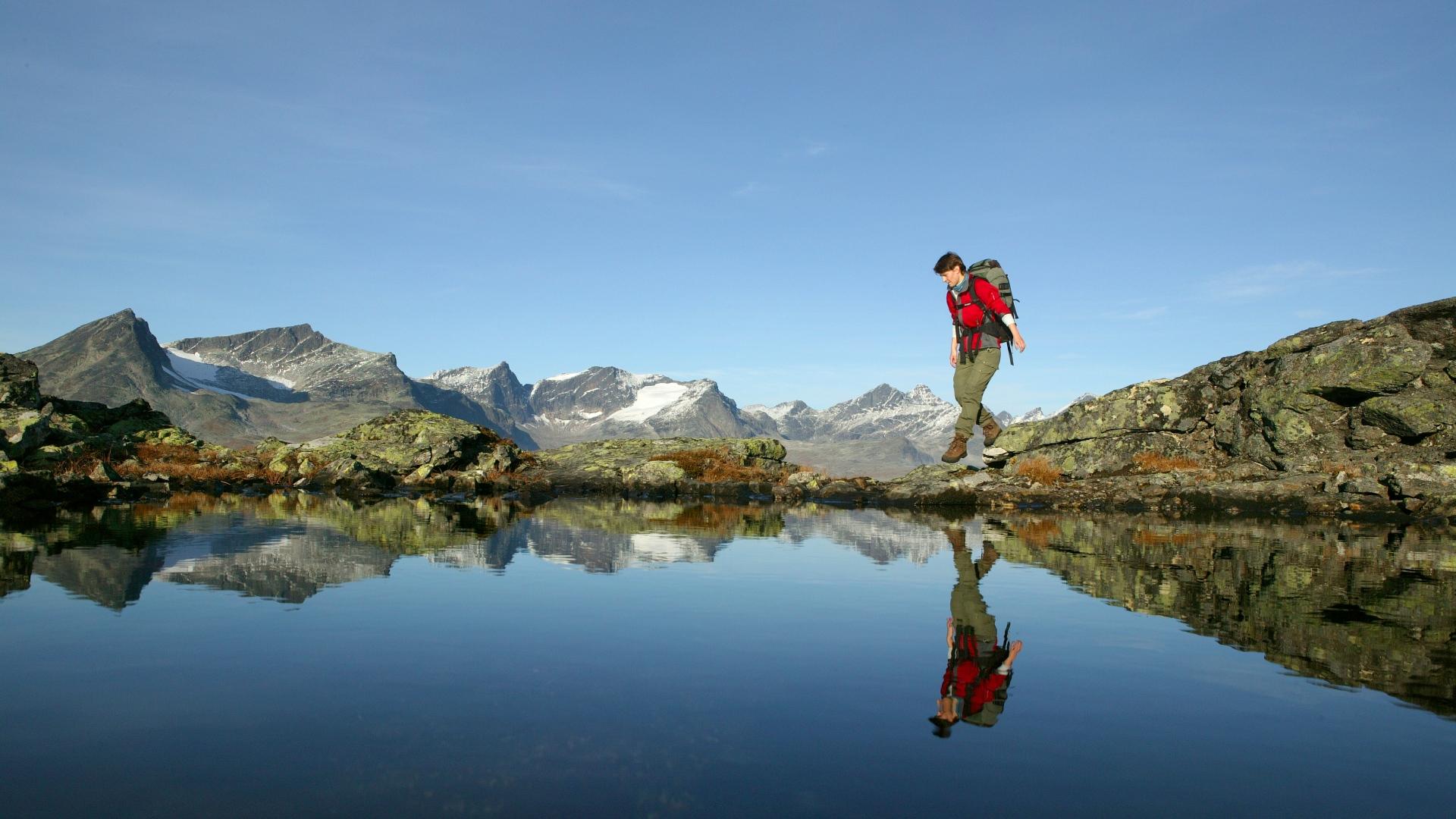 Woman walking Besseggen in Valdres