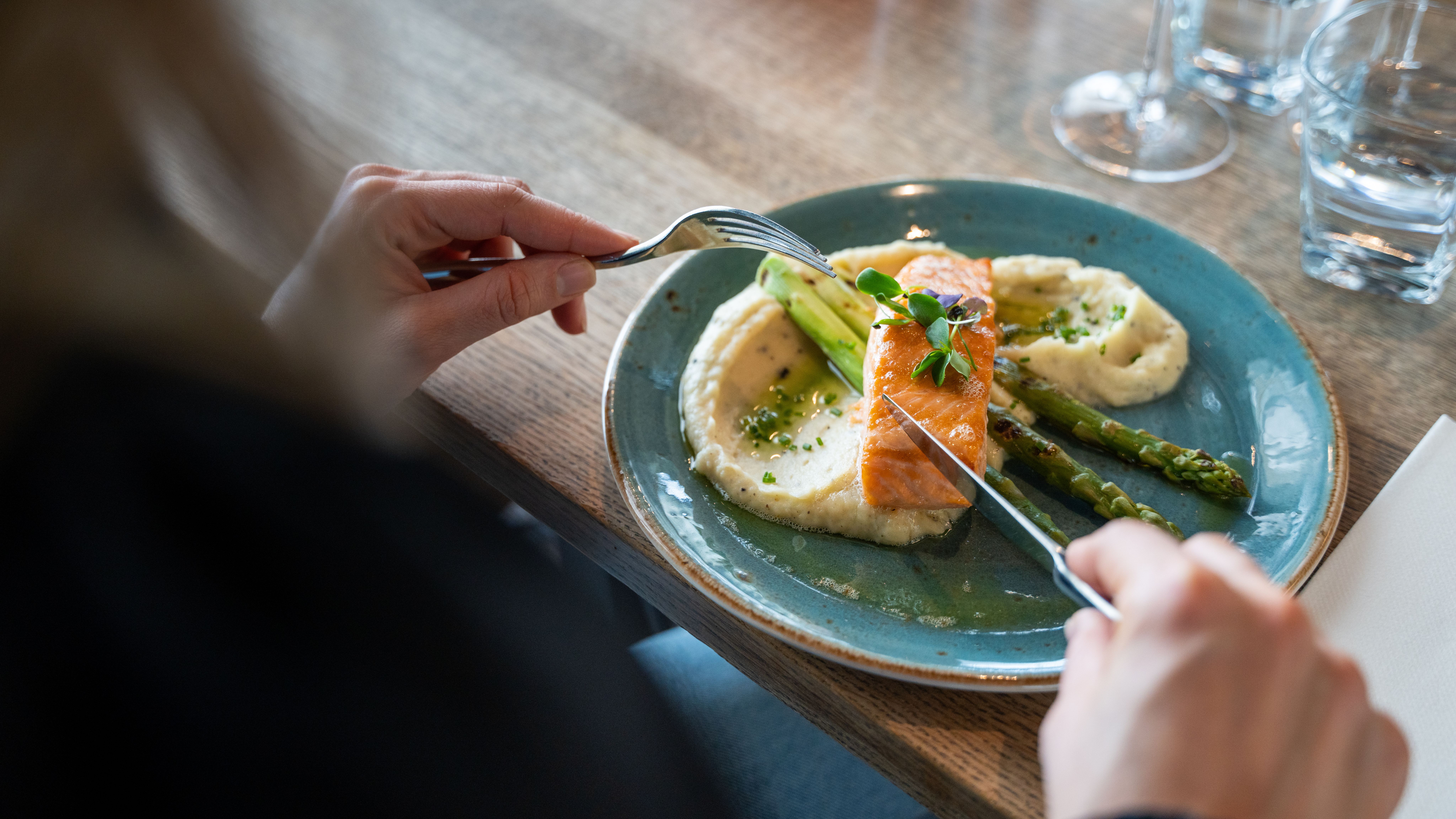 Grilled salmon on the plate at The Salmon, Tjuvholmen in Oslo