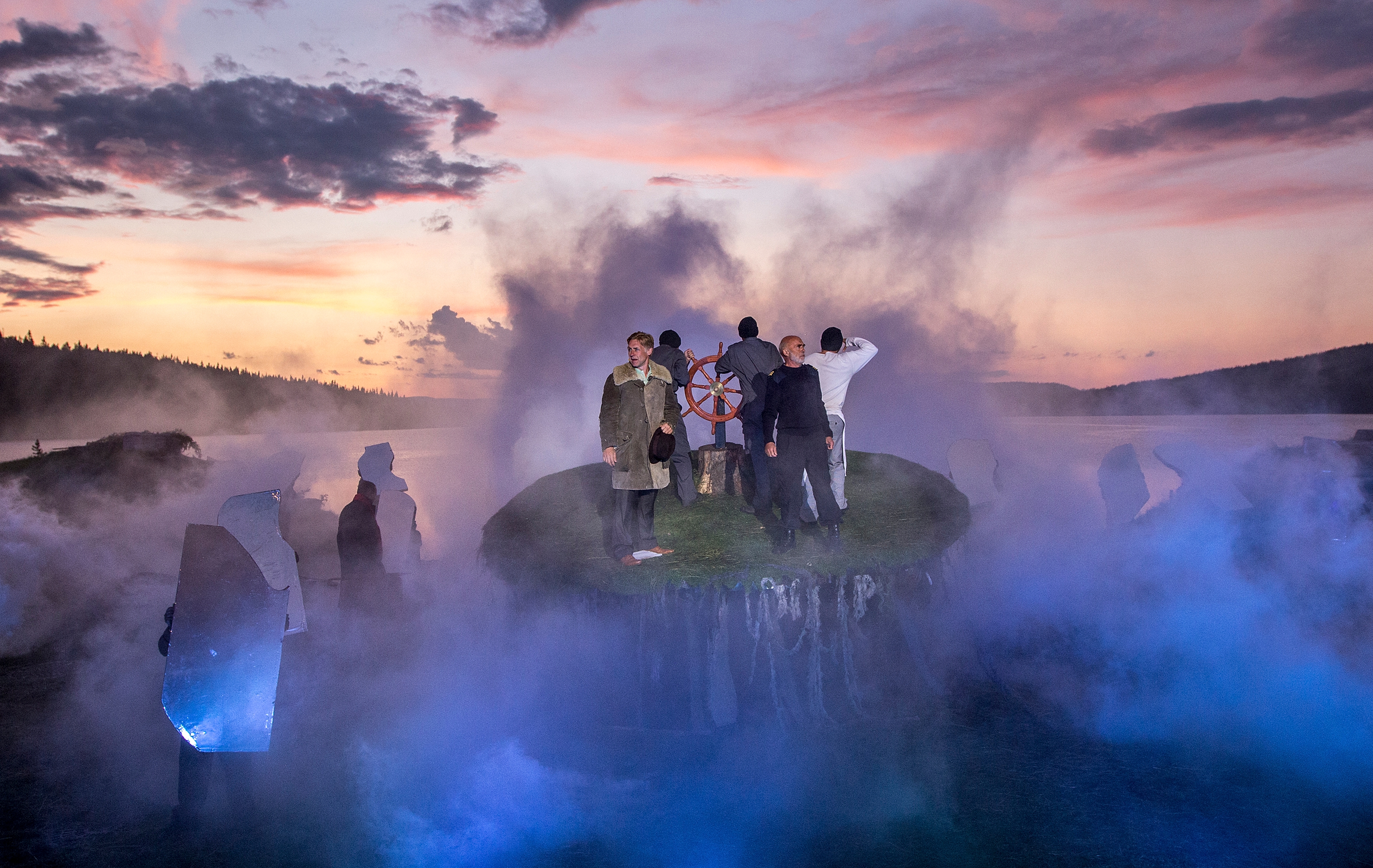 Multiple actors on stage, surrounded by smoke at the Peer Gynt Festival, Gålå, Eastern Norway