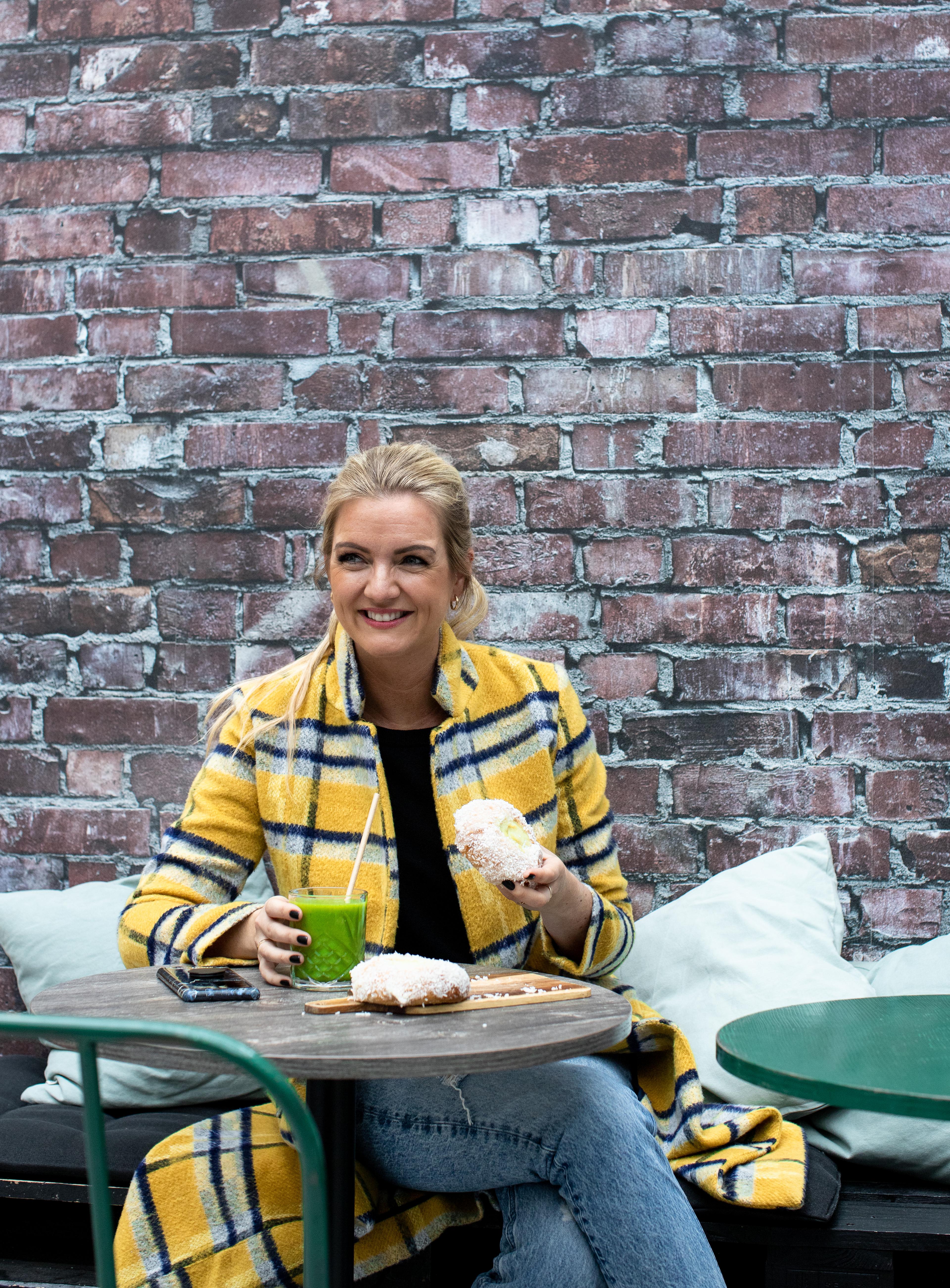 Cookbook author and blogger, Hanne-Lene Dahlgren, eating..