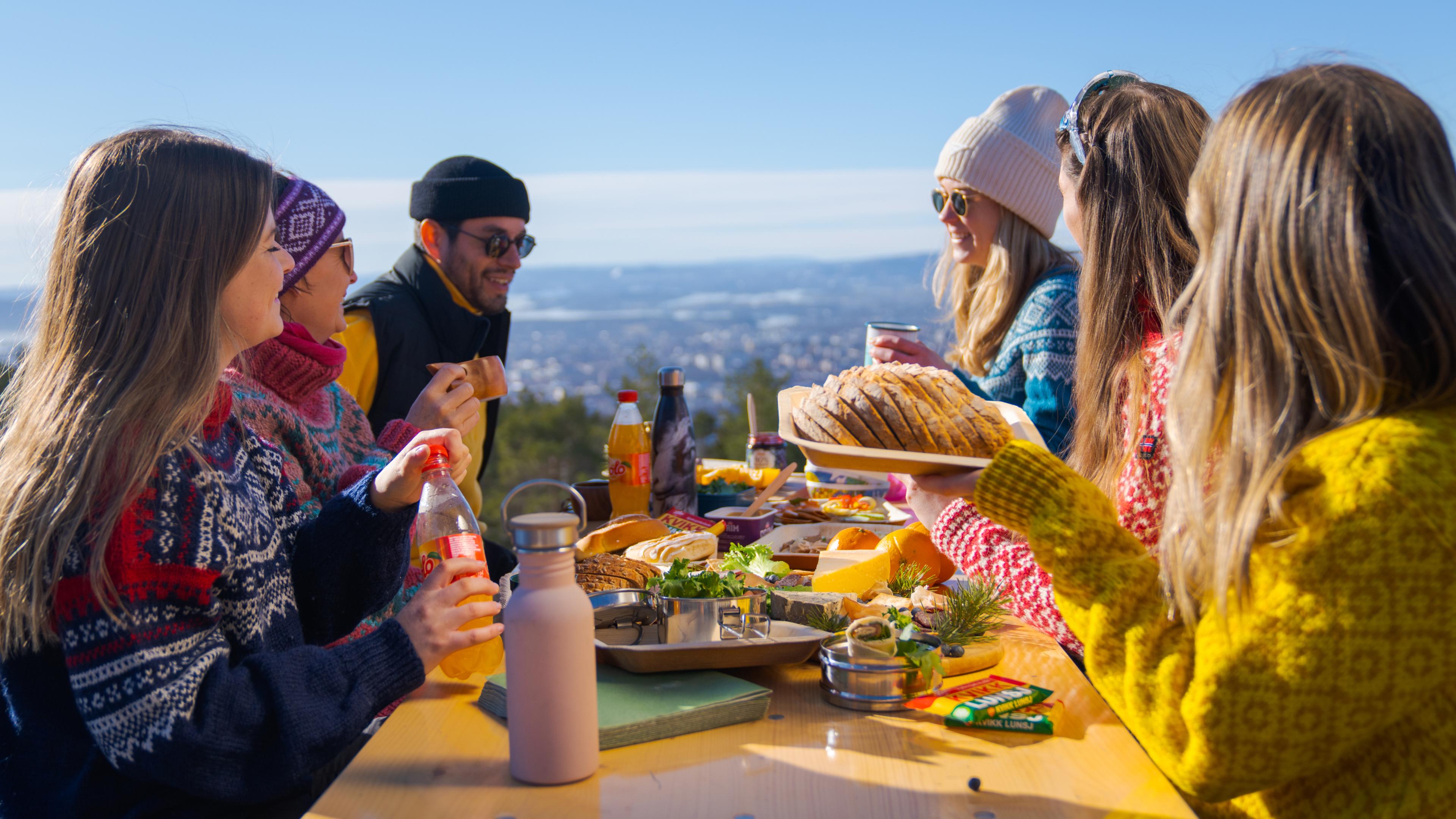 Friends eating lunch at Grefsenkollen in Oslo, Eastern Norway