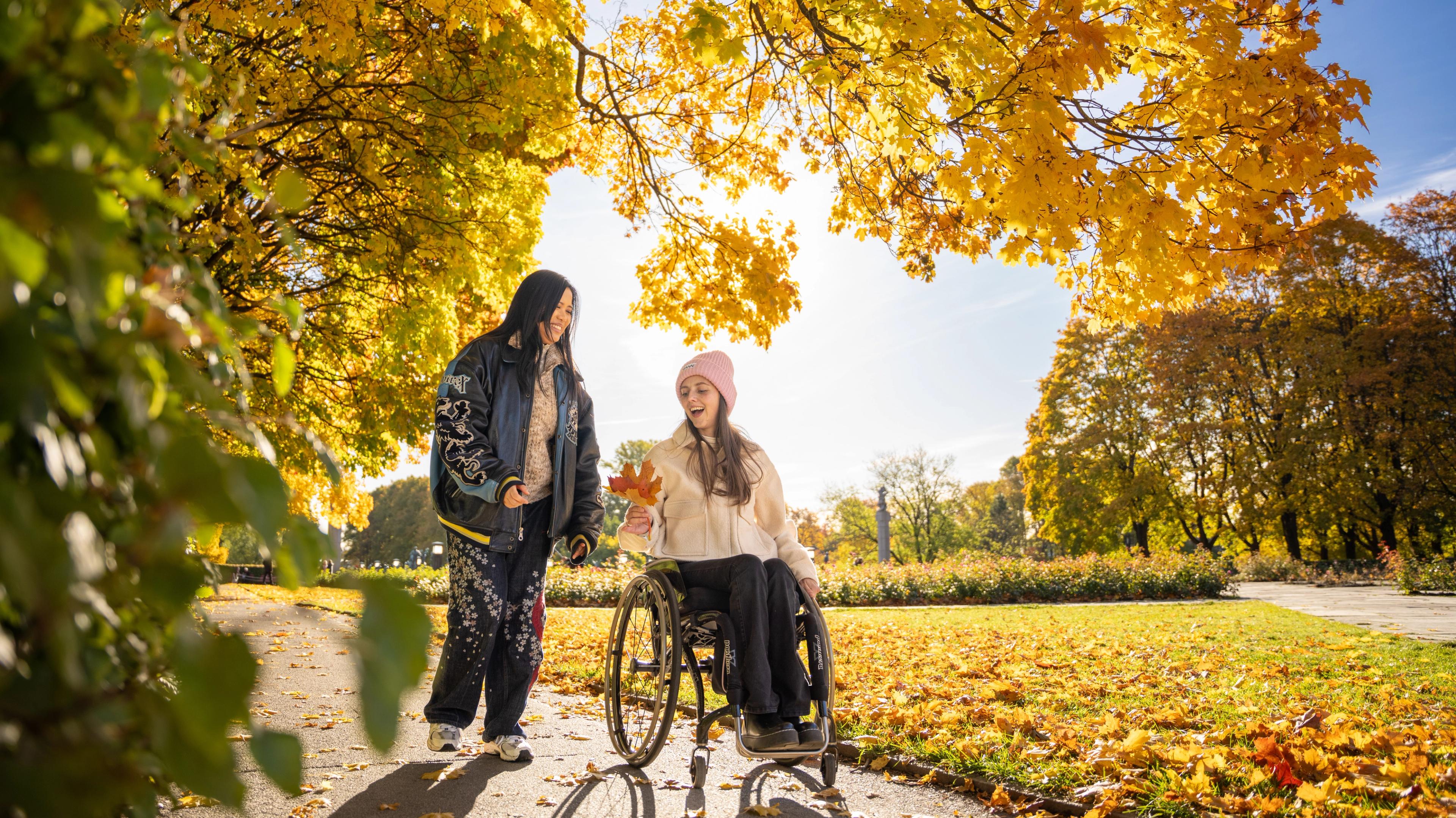 Two women in Vigelandsparken at Frogner in Oslo, Eastern Norway