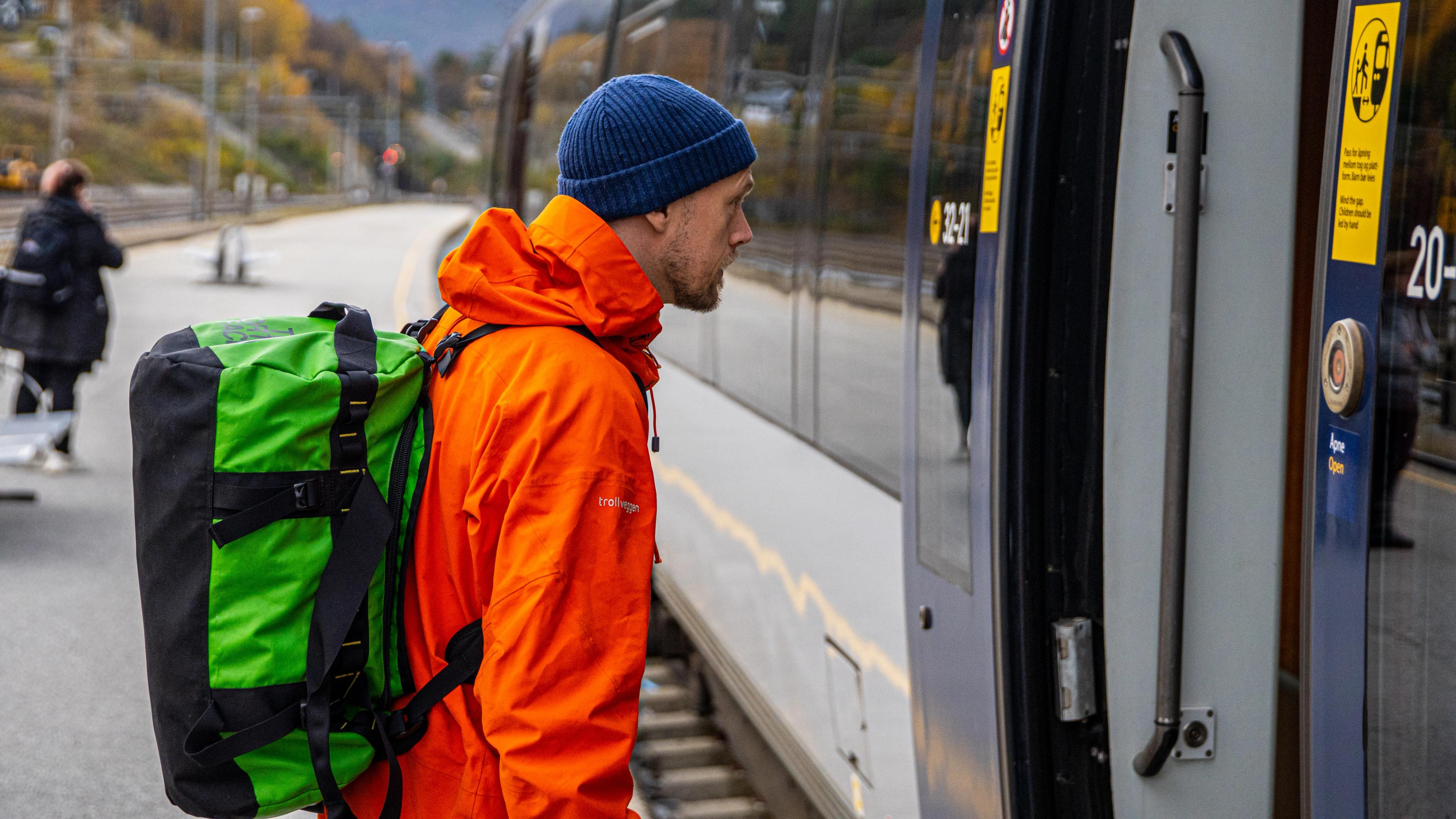 A man boards the Rauma Railway train