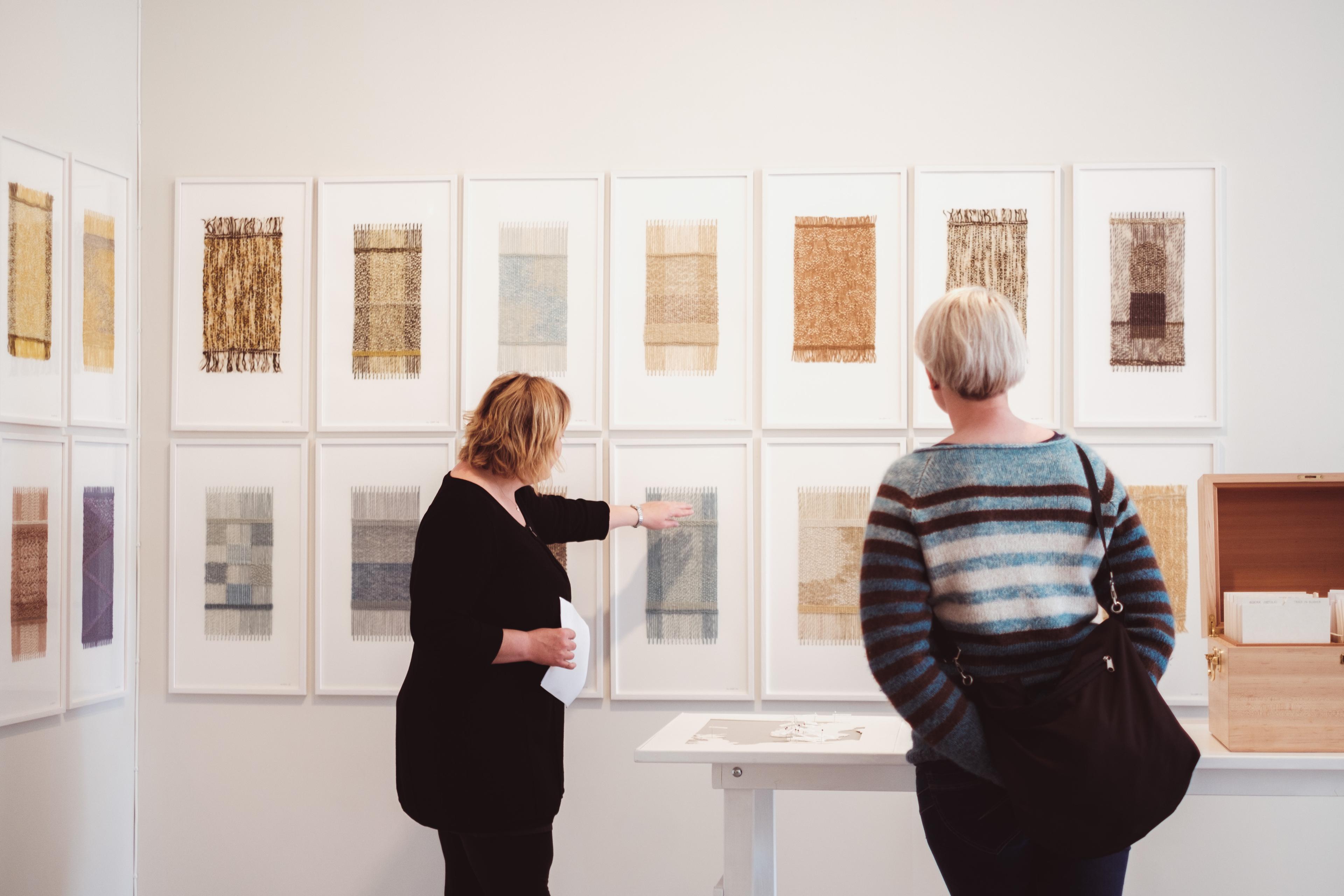 People looking at artwork at Østfold Art Centre in Fredrikstad, Eastern Norway