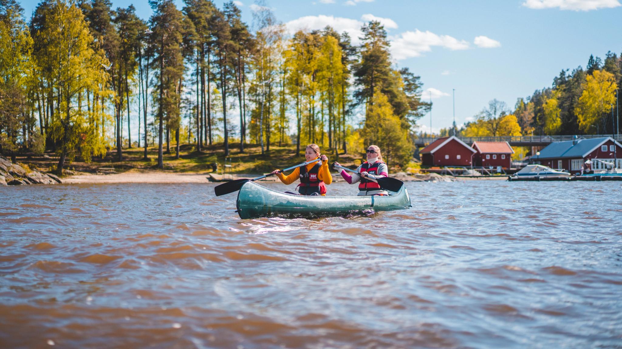 People paddling on a lake in Indre Østfold, Eastern Norway
