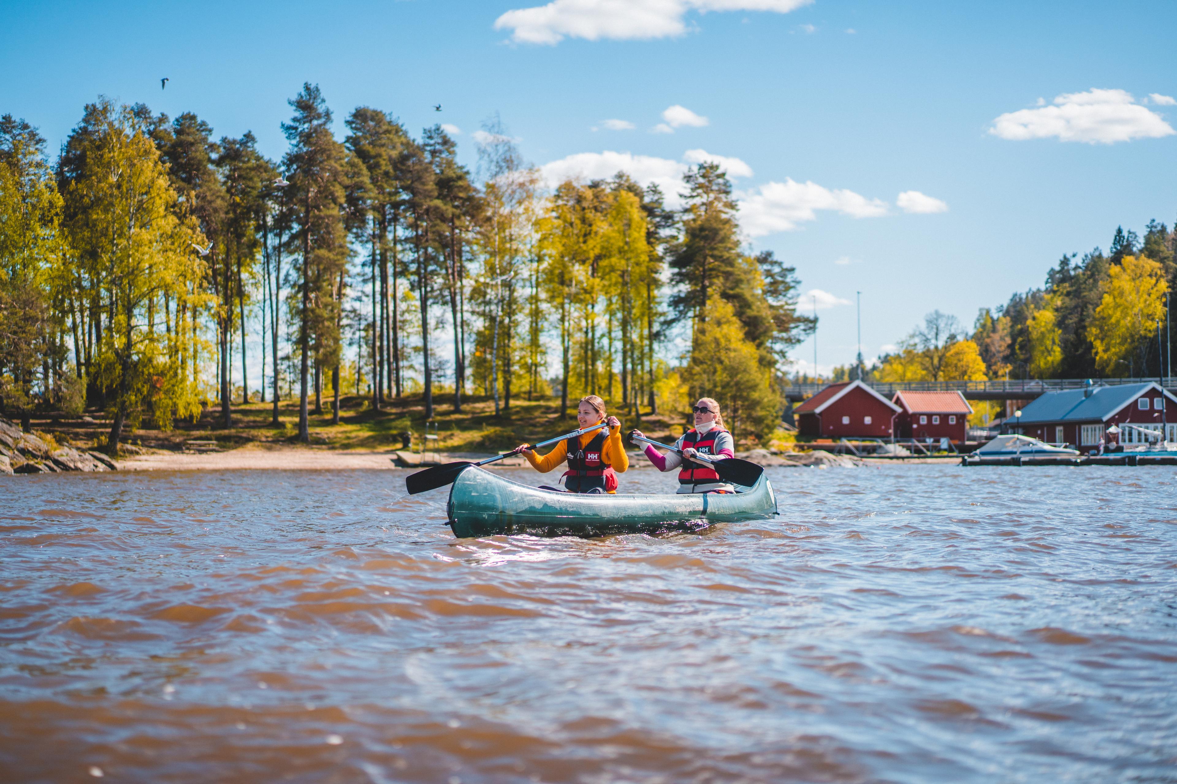 People paddling on a lake in Indre Østfold, Eastern Norway
