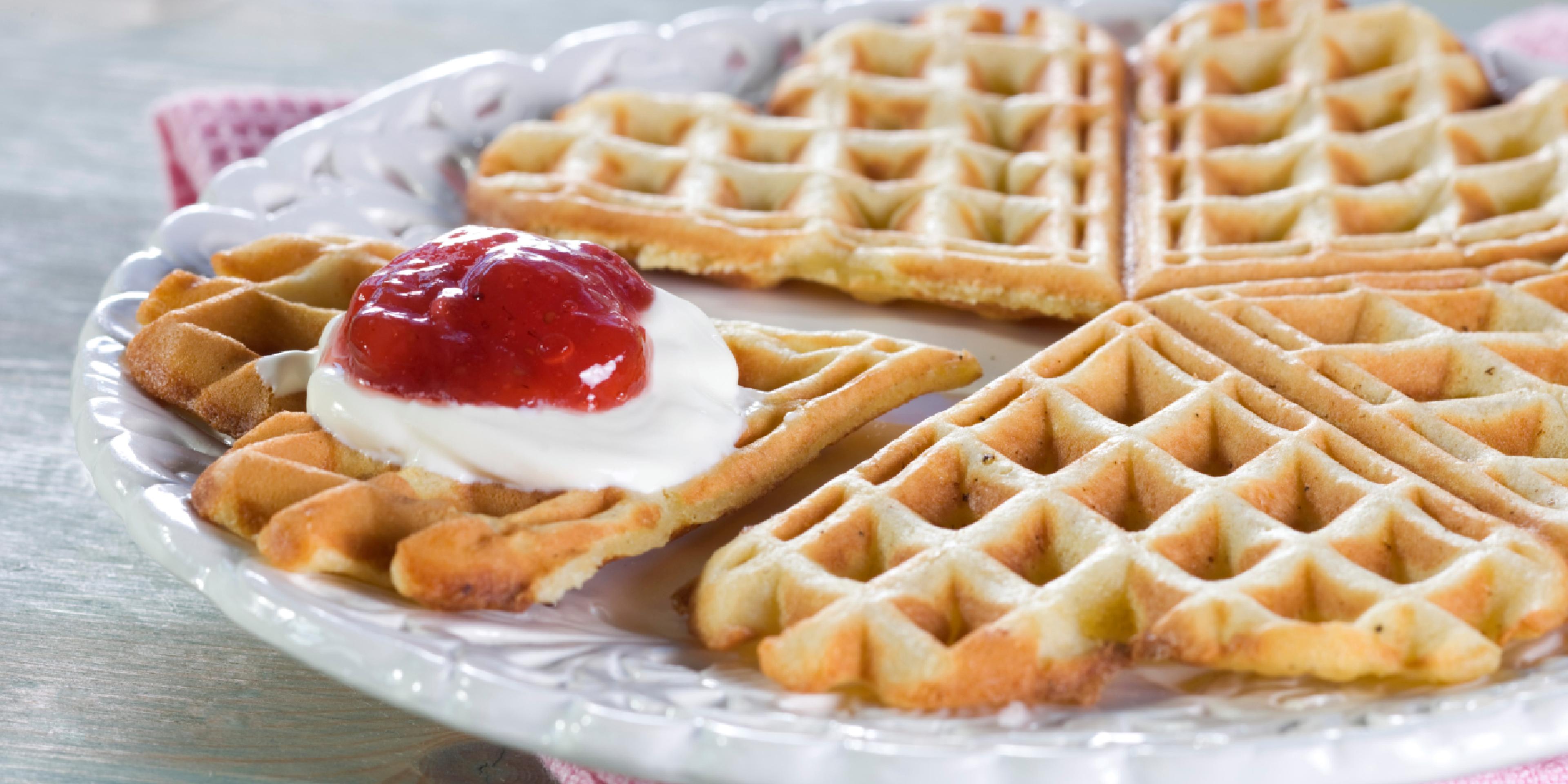 A Norwegian Waffle with sour cream and jam.