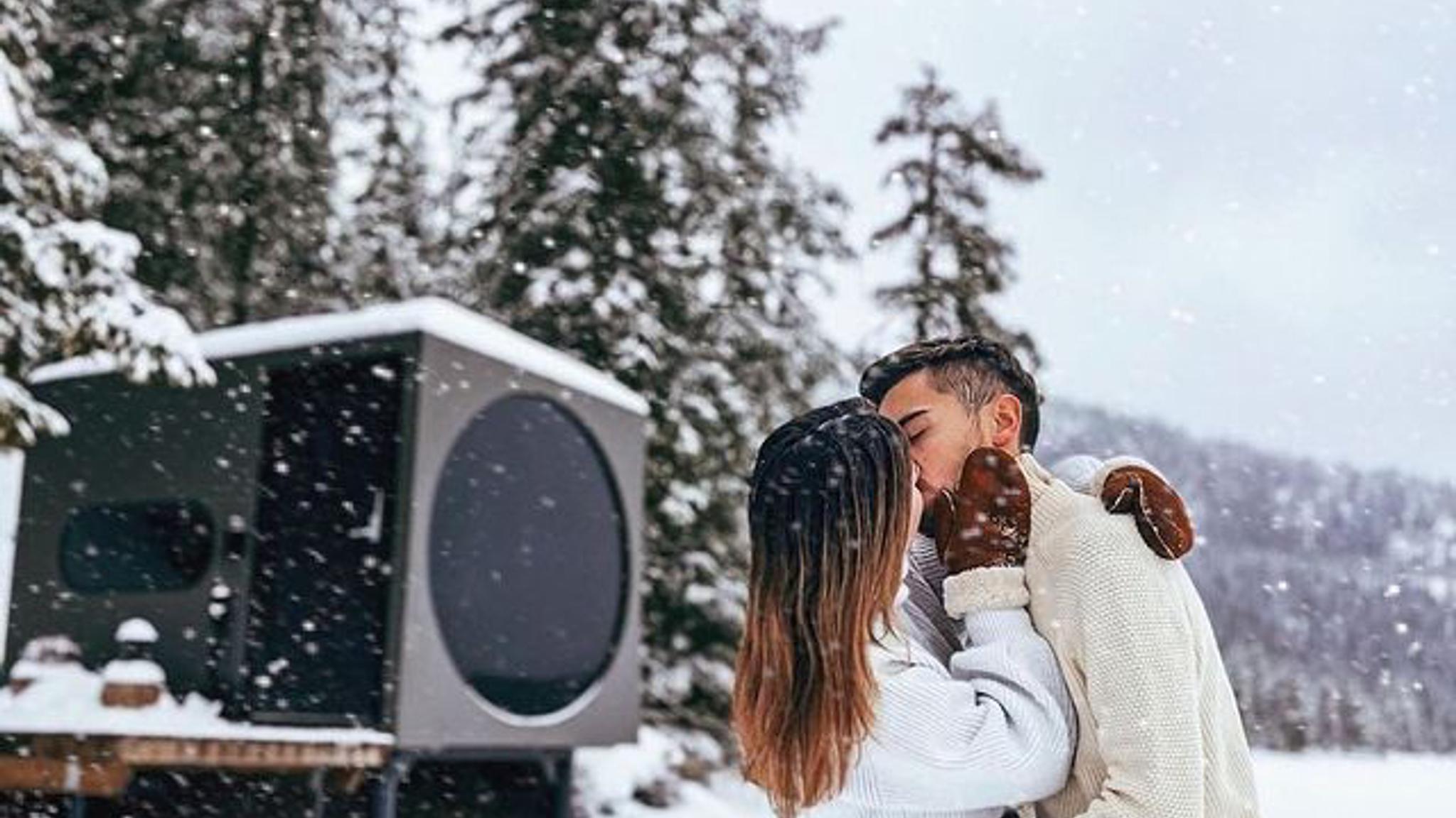 Couple kissing in front of Birdbox in Fauske, Northern Norway