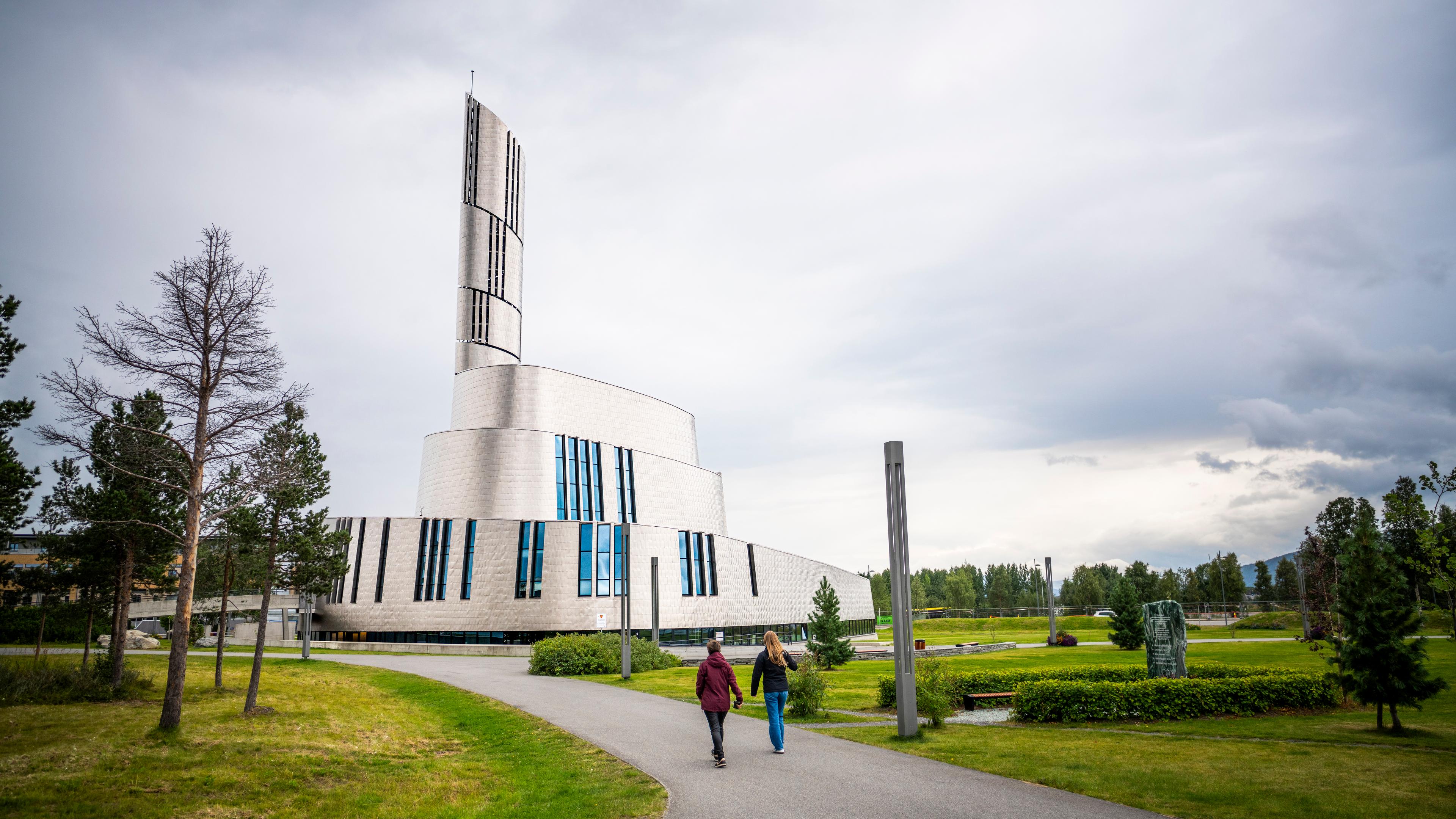 Tourists visiting Nordlyskatedralen in Alta