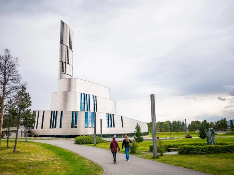 Tourists visiting Nordlyskatedralen in Alta