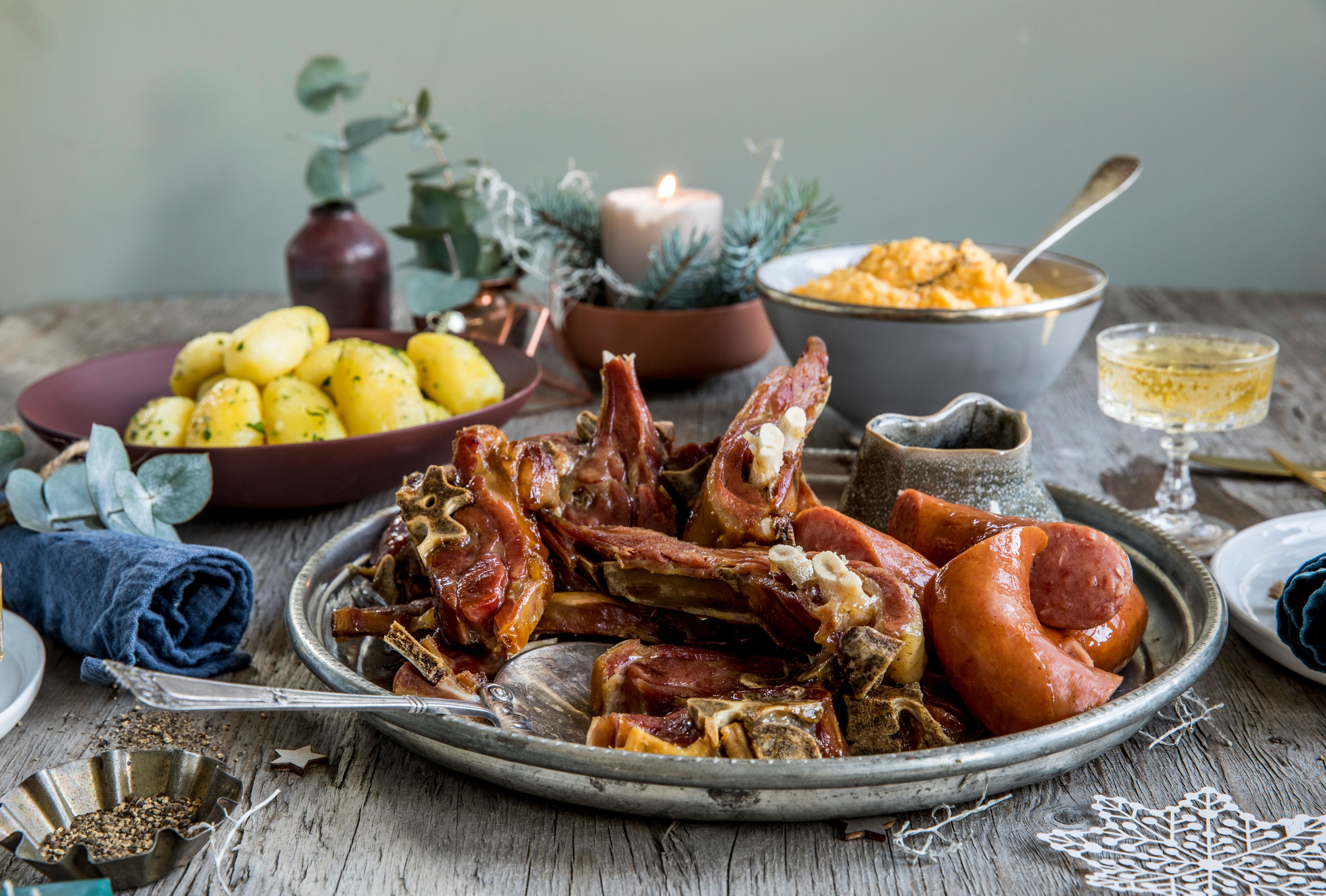 Plate of pinnekjøtt with side dishes