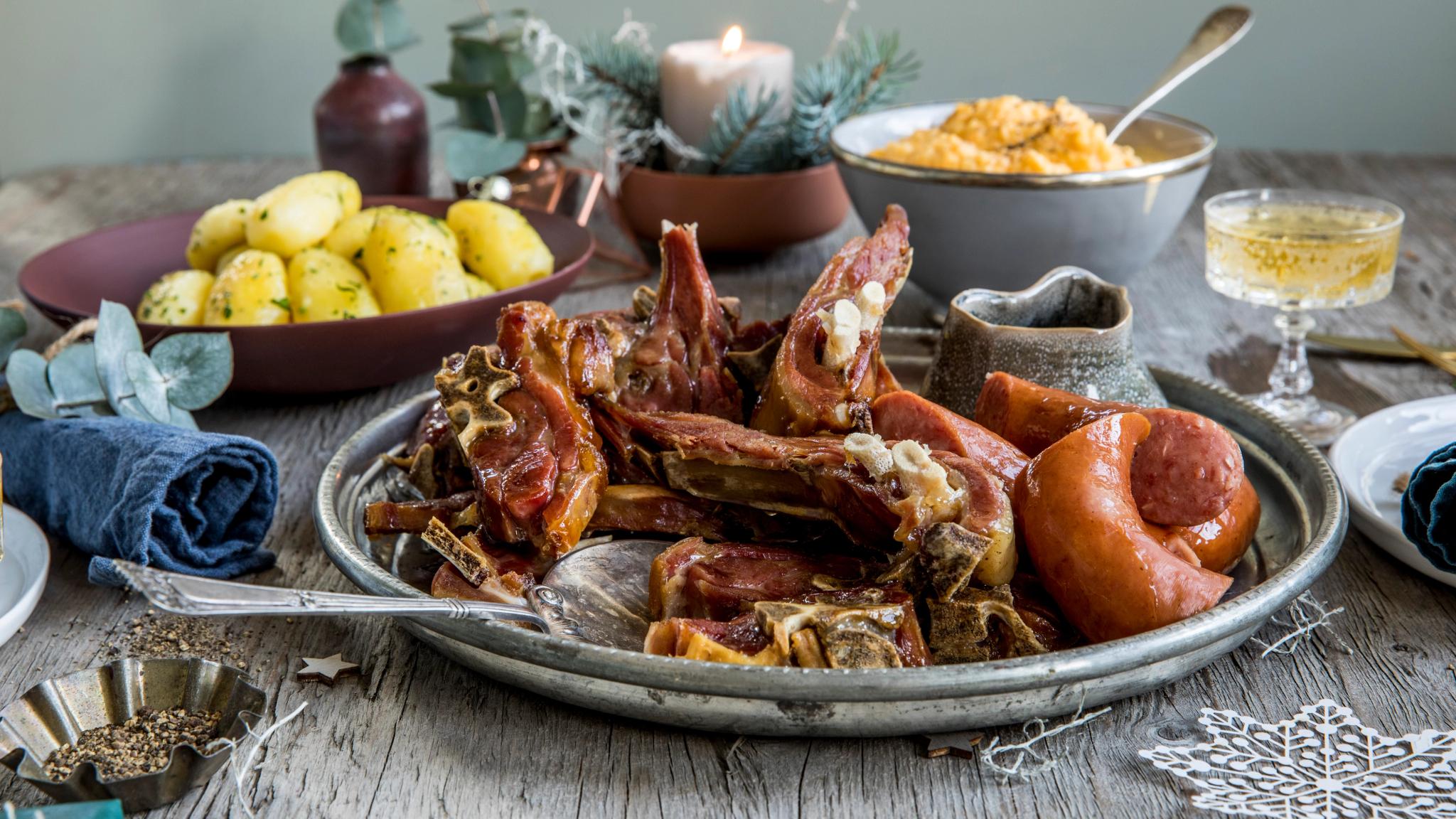 Plate of pinnekjøtt with side dishes