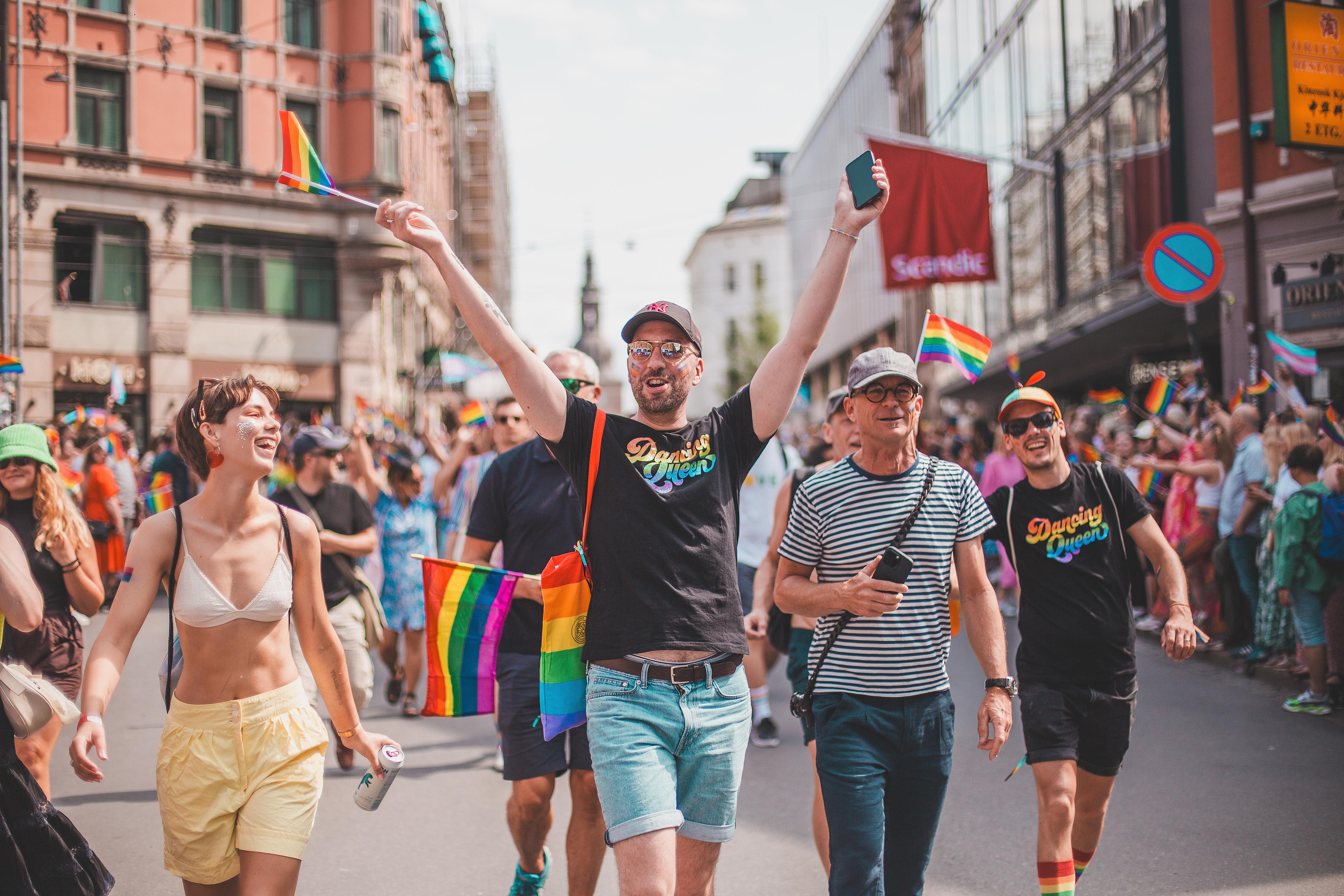 Happy people marching at the Oslo Pride parade, in 2023
