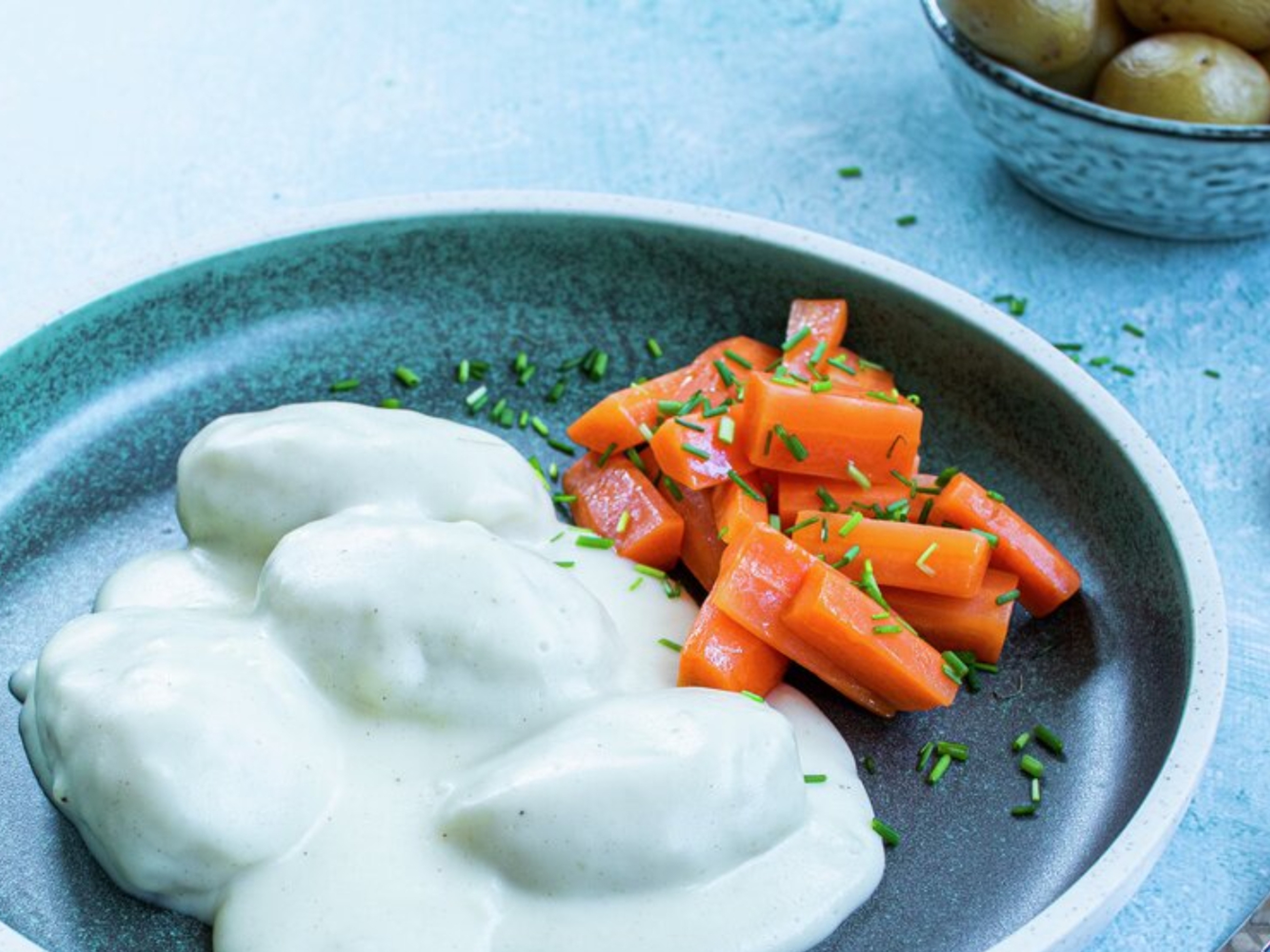 Fiskeboller i hvit saus