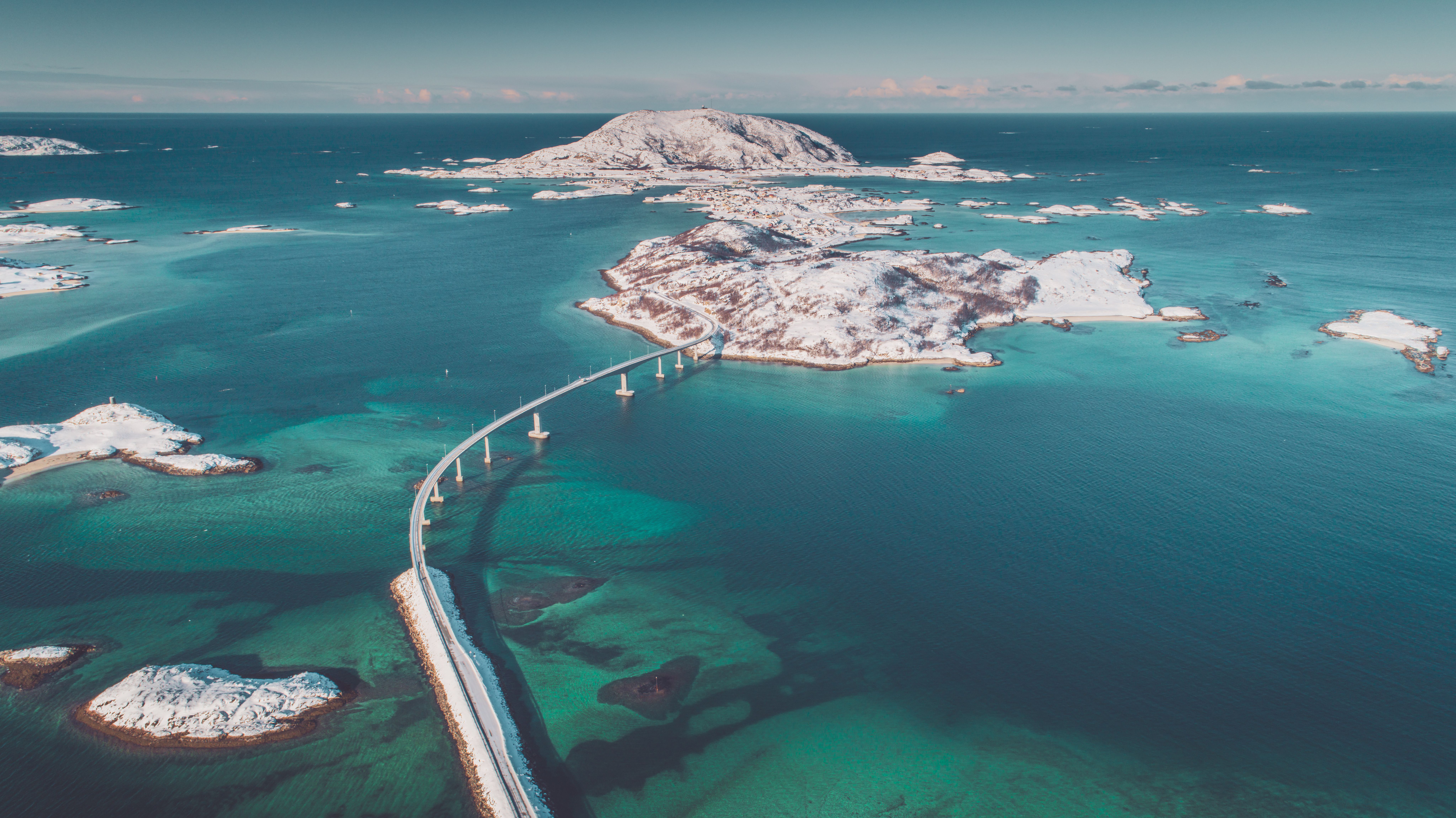 A bird's view of the bridge leading out to the island of Sommarøy by Tromsø in winter
