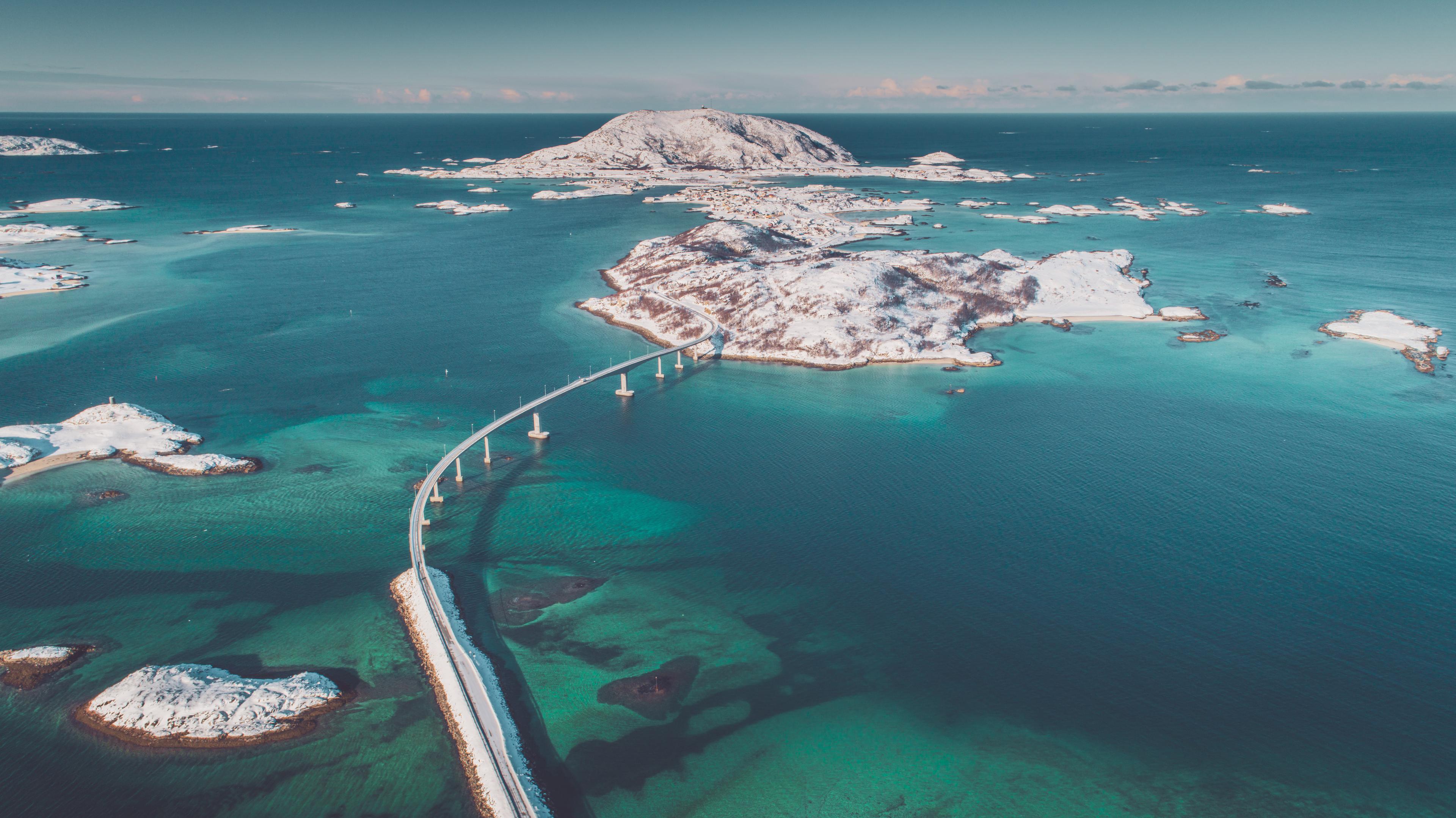 A bird's view of the bridge leading out to the island of Sommarøy by Tromsø in winter