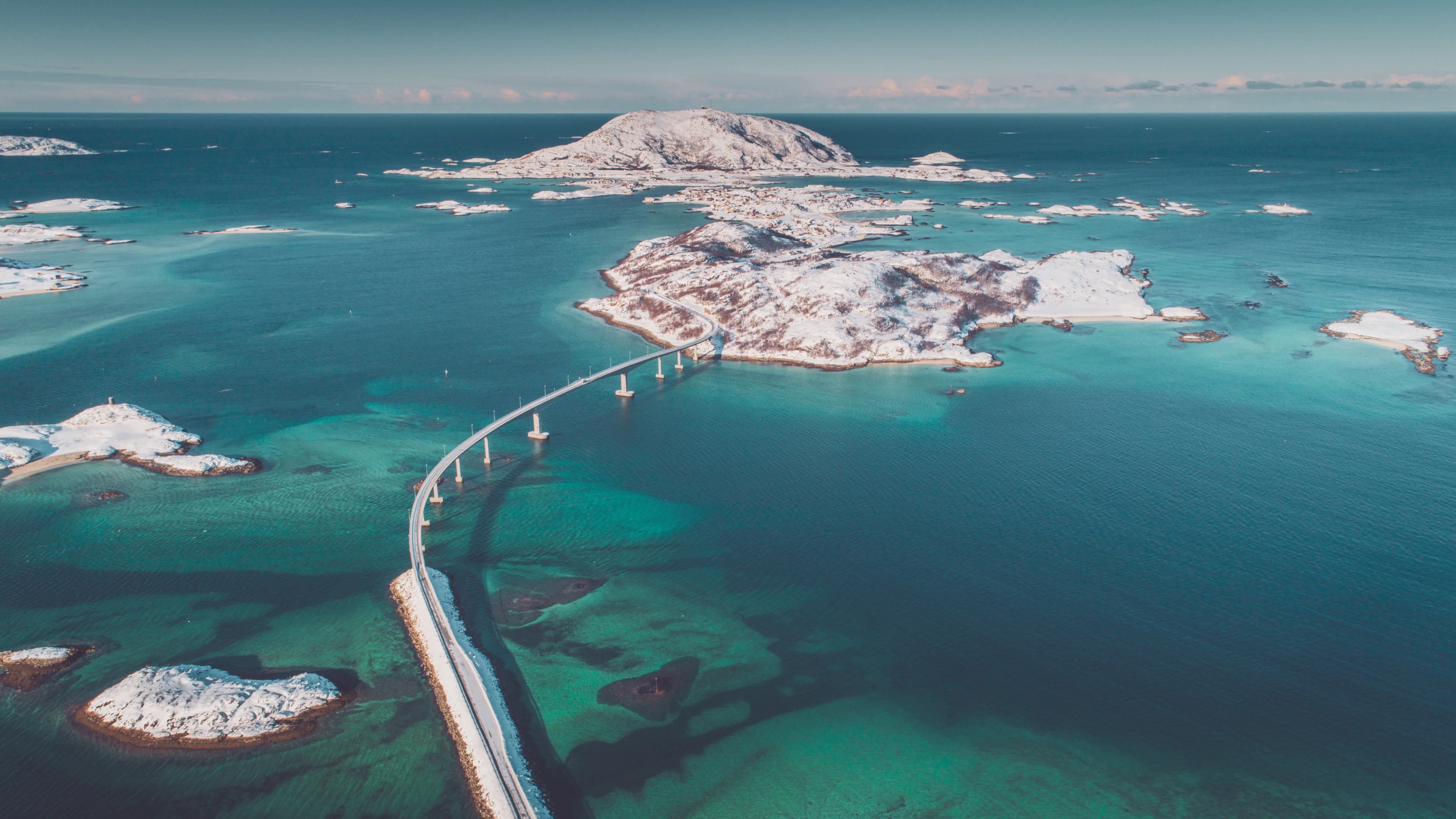 A bird's view of the bridge leading out to the island of Sommarøy by Tromsø in winter