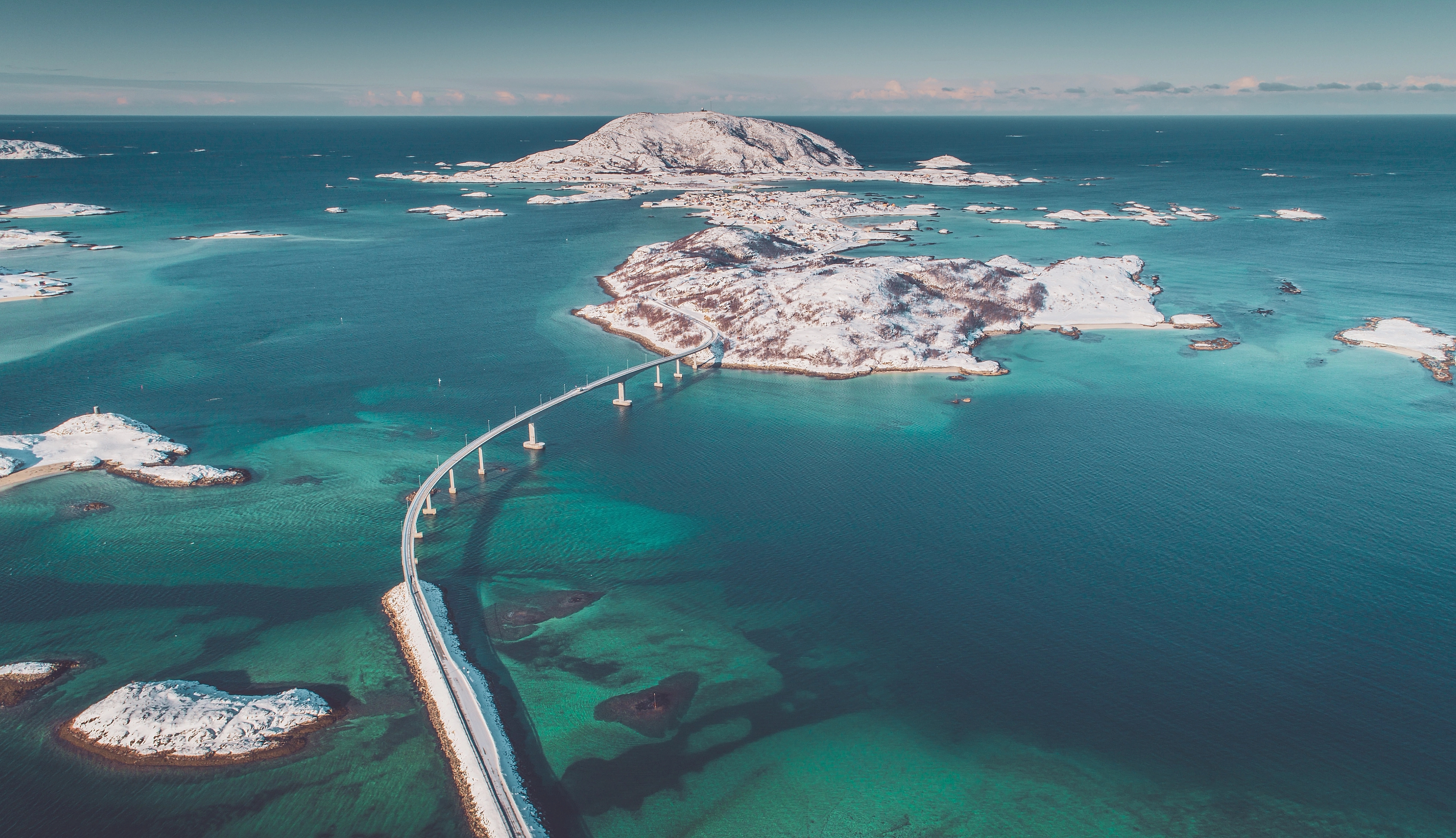 A bird's view of the bridge leading out to the island of Sommarøy by Tromsø in winter