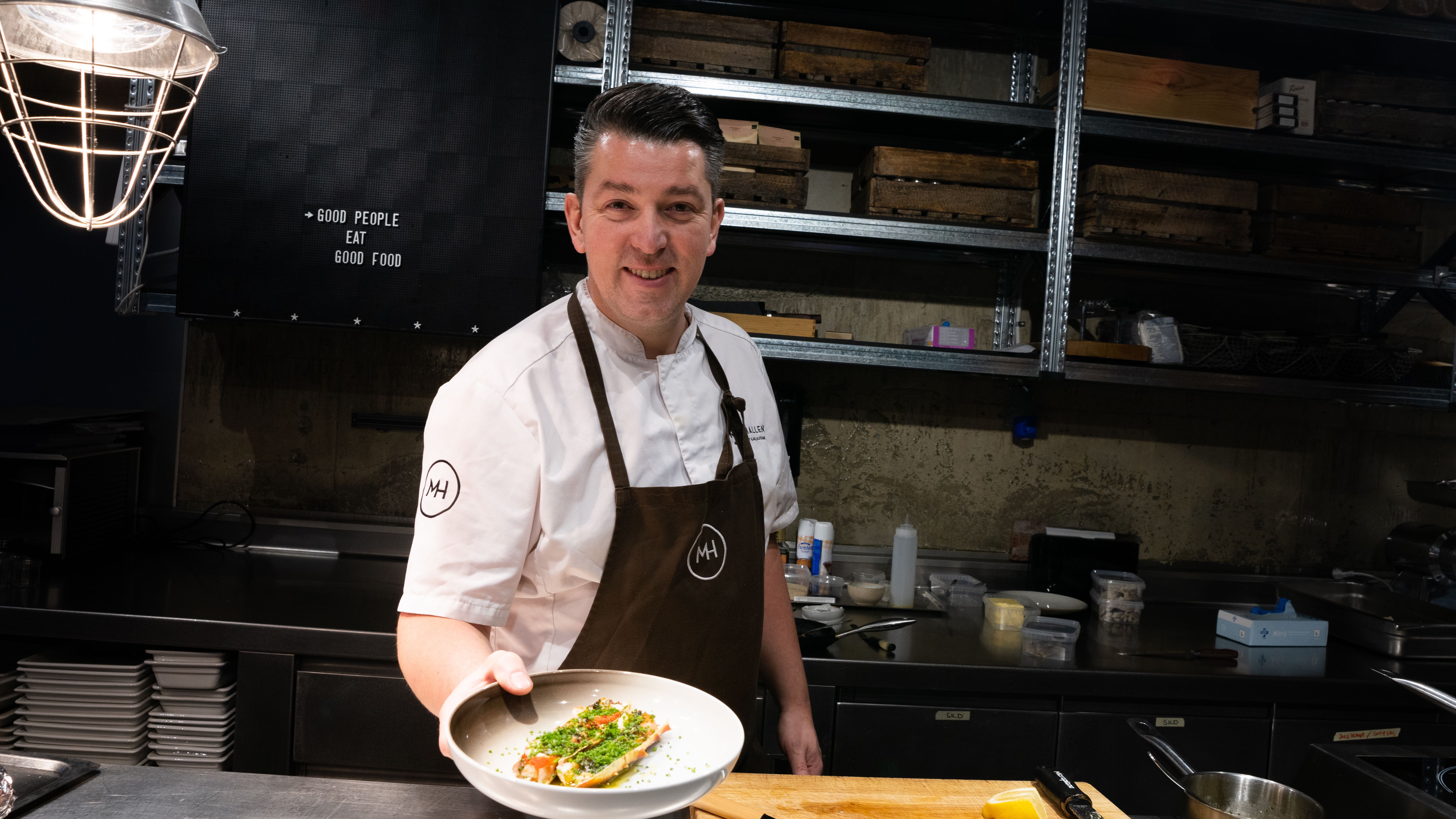 Chef Gunnar Jensen cooking king crab at Mathallen in Tromsø