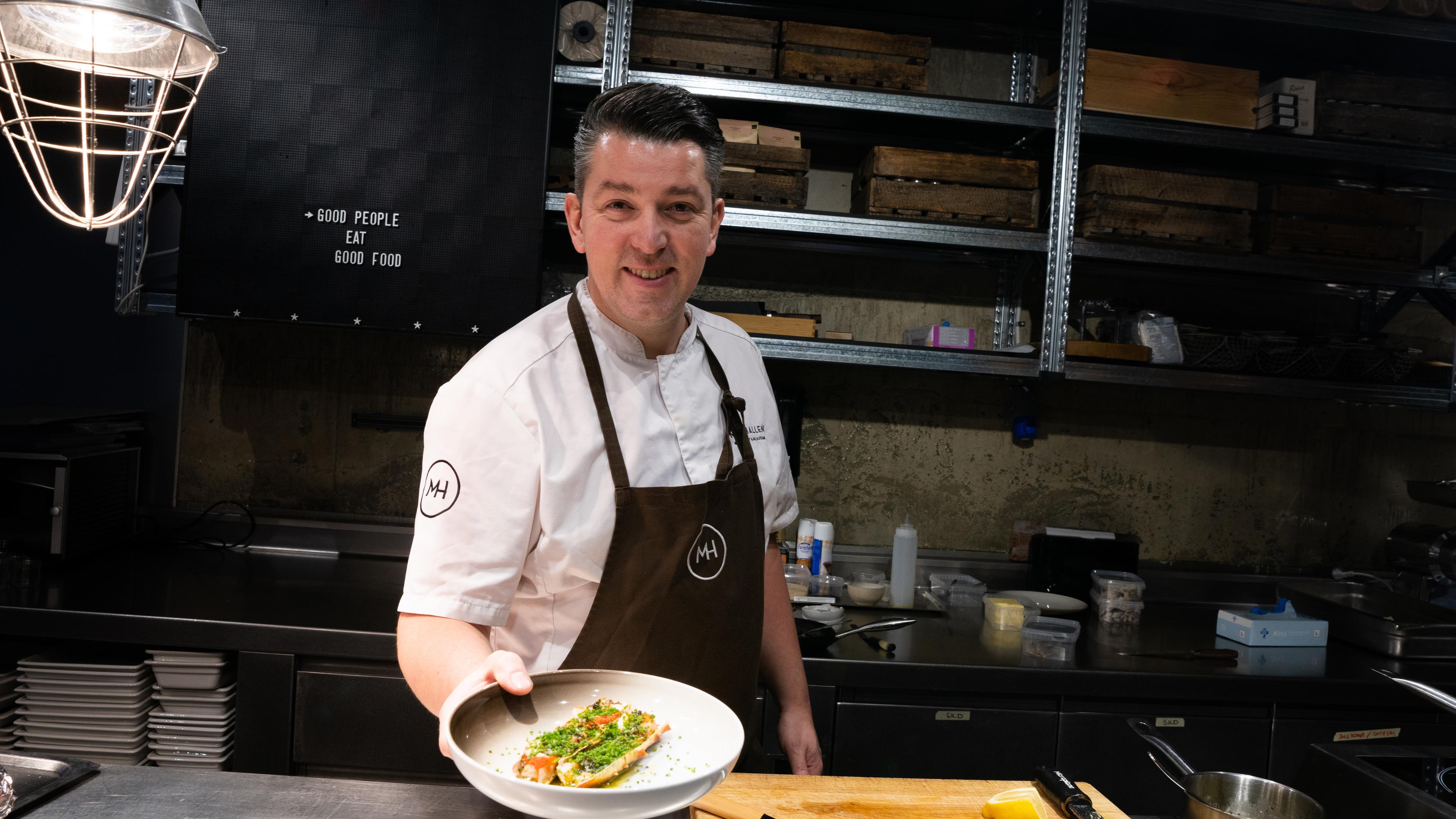 Chef Gunnar Jensen cooking king crab at Mathallen in Tromsø